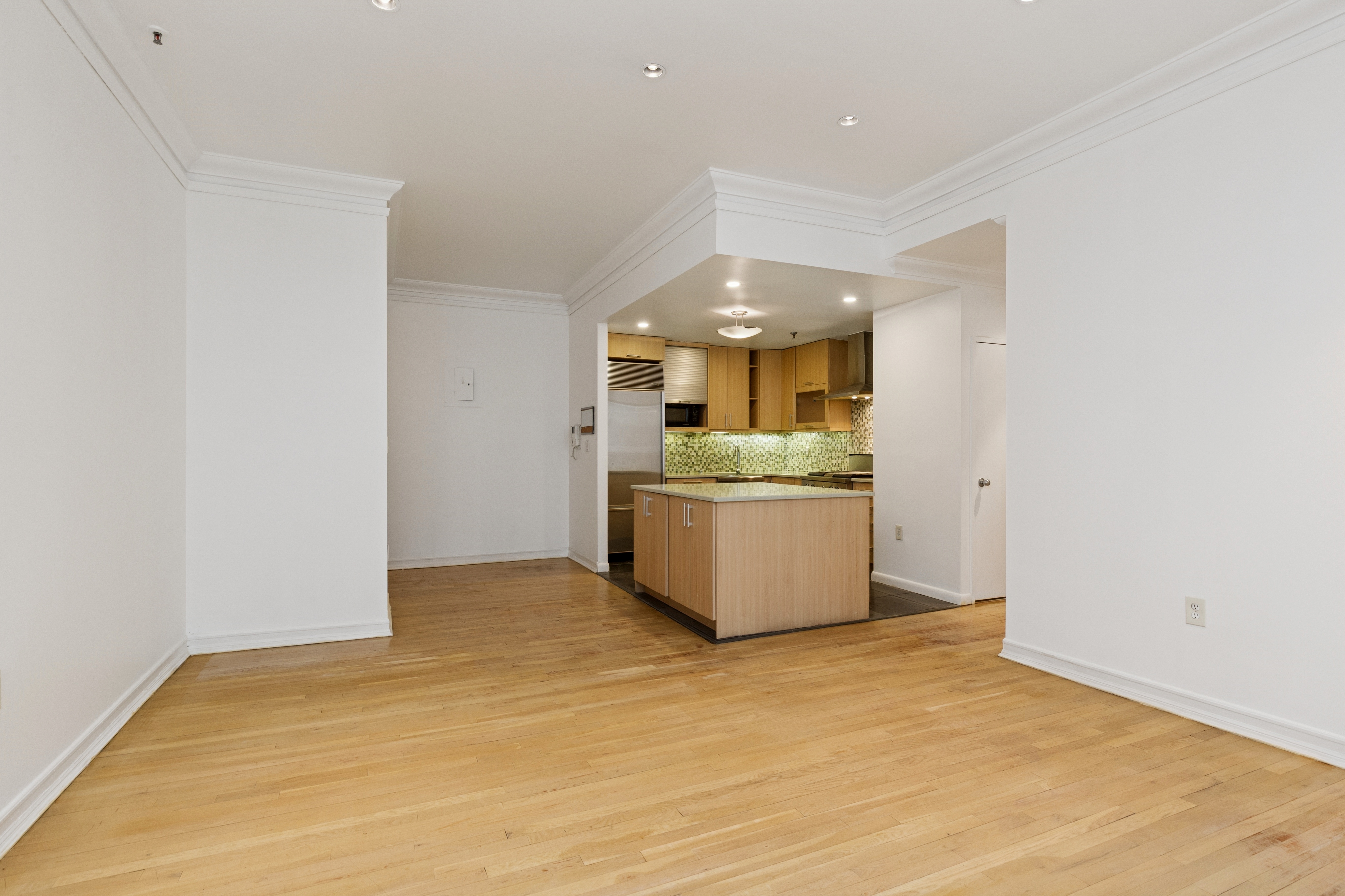 136-140 West 23rd Street, Unit 4CC Manhattan, NY 10011 - Photo 4 of 13 a view of a kitchen with a sink