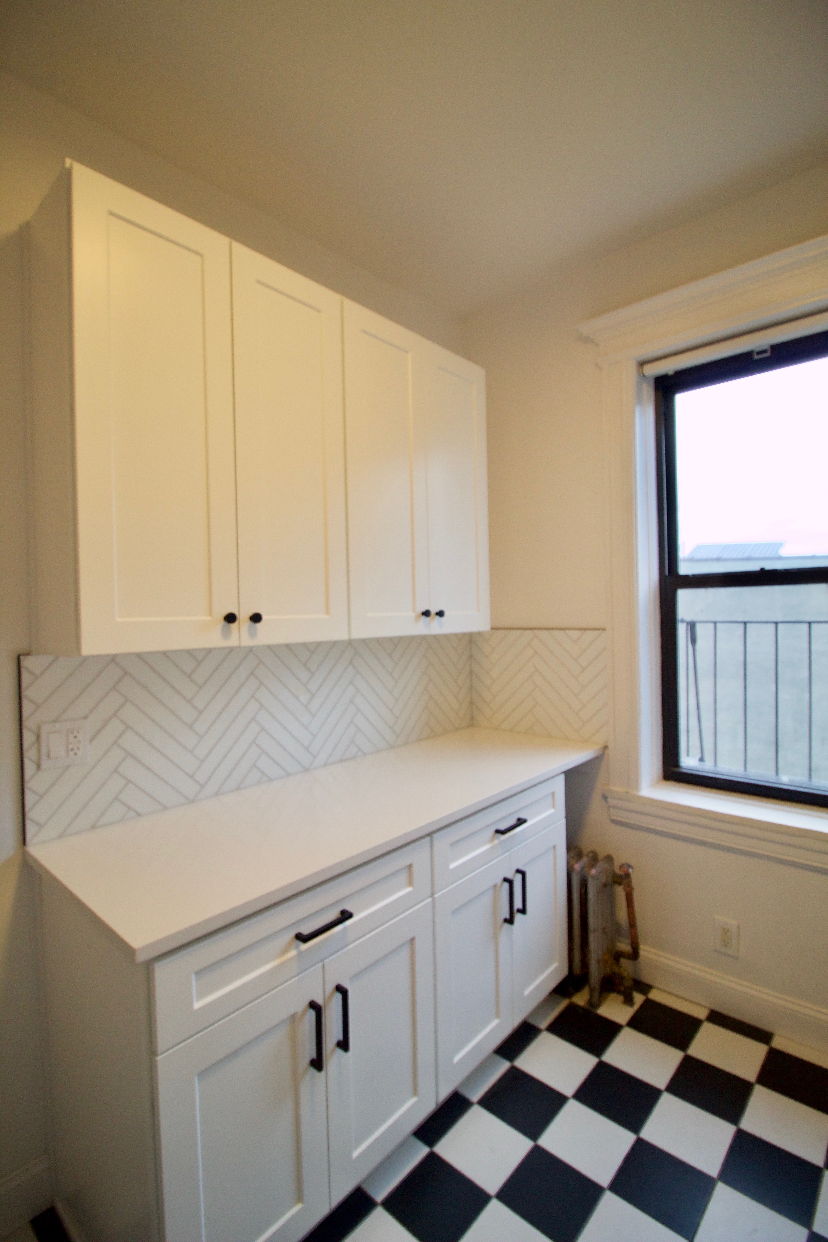 403 Caton Avenue, Unit 3 Brooklyn, NY 11218 - Photo 11 of 31 a kitchen with a sink and cabinets
