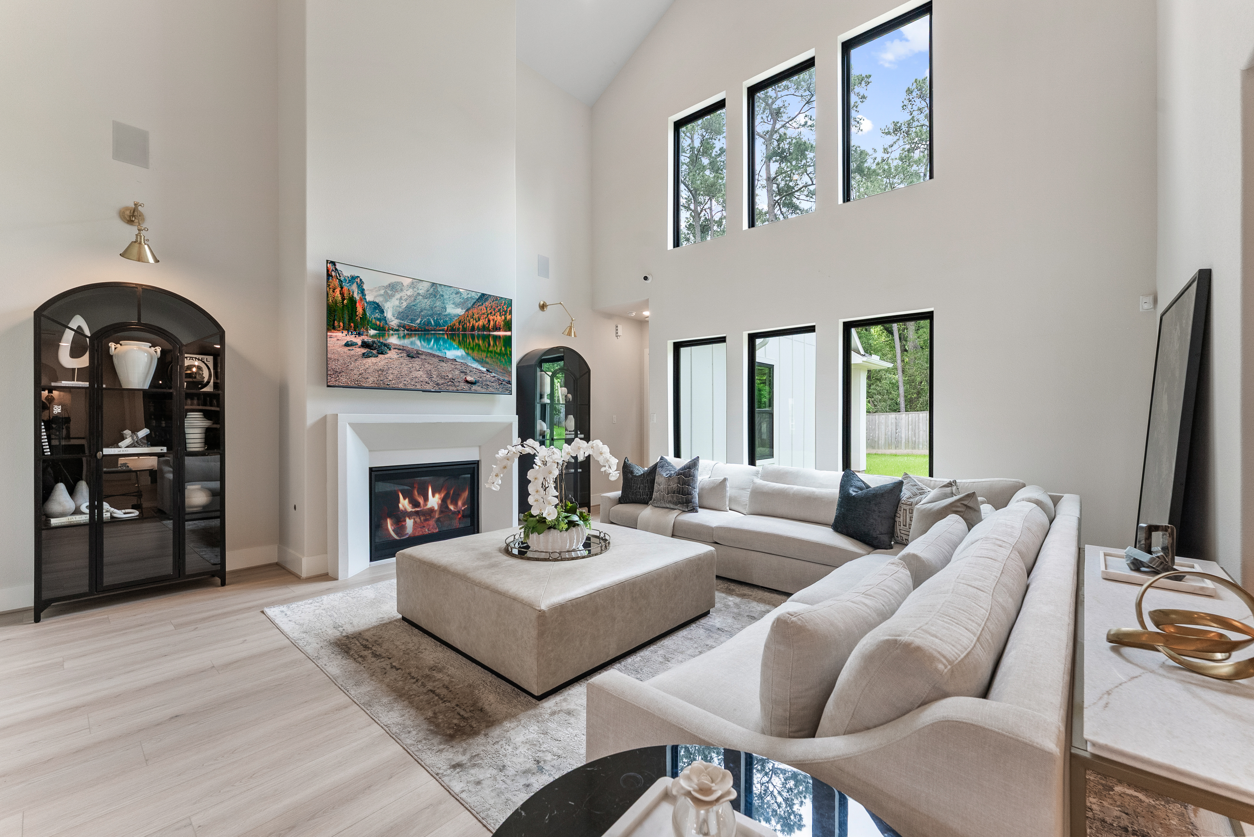 2118 Bennet Court Conroe, TX 77384 - Photo 13 of 70 a living room with furniture and a fireplace