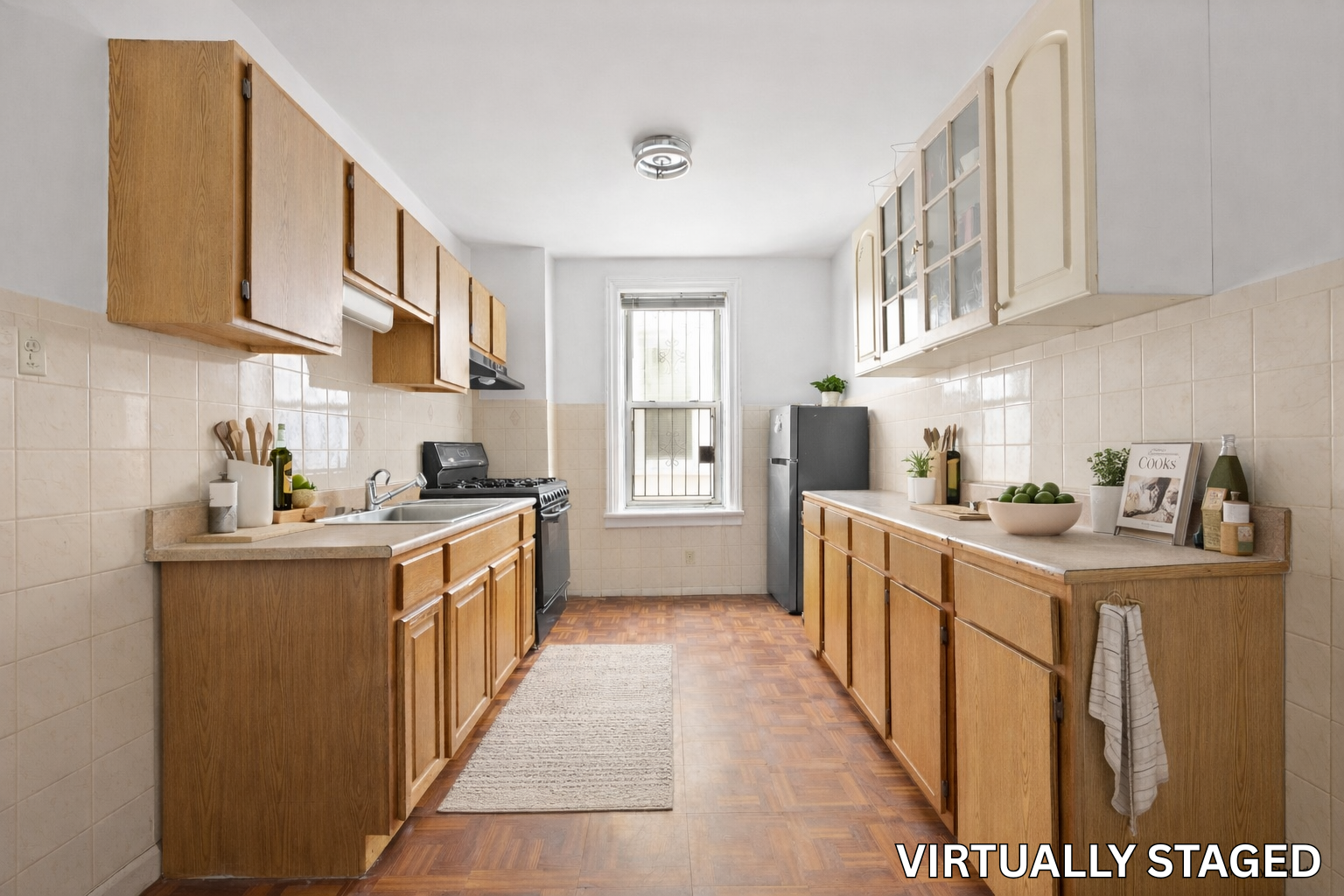742 44th Street Brooklyn, NY 11220 - Photo 16 of 23 a kitchen with stainless steel appliances granite countertop a sink and cabinets