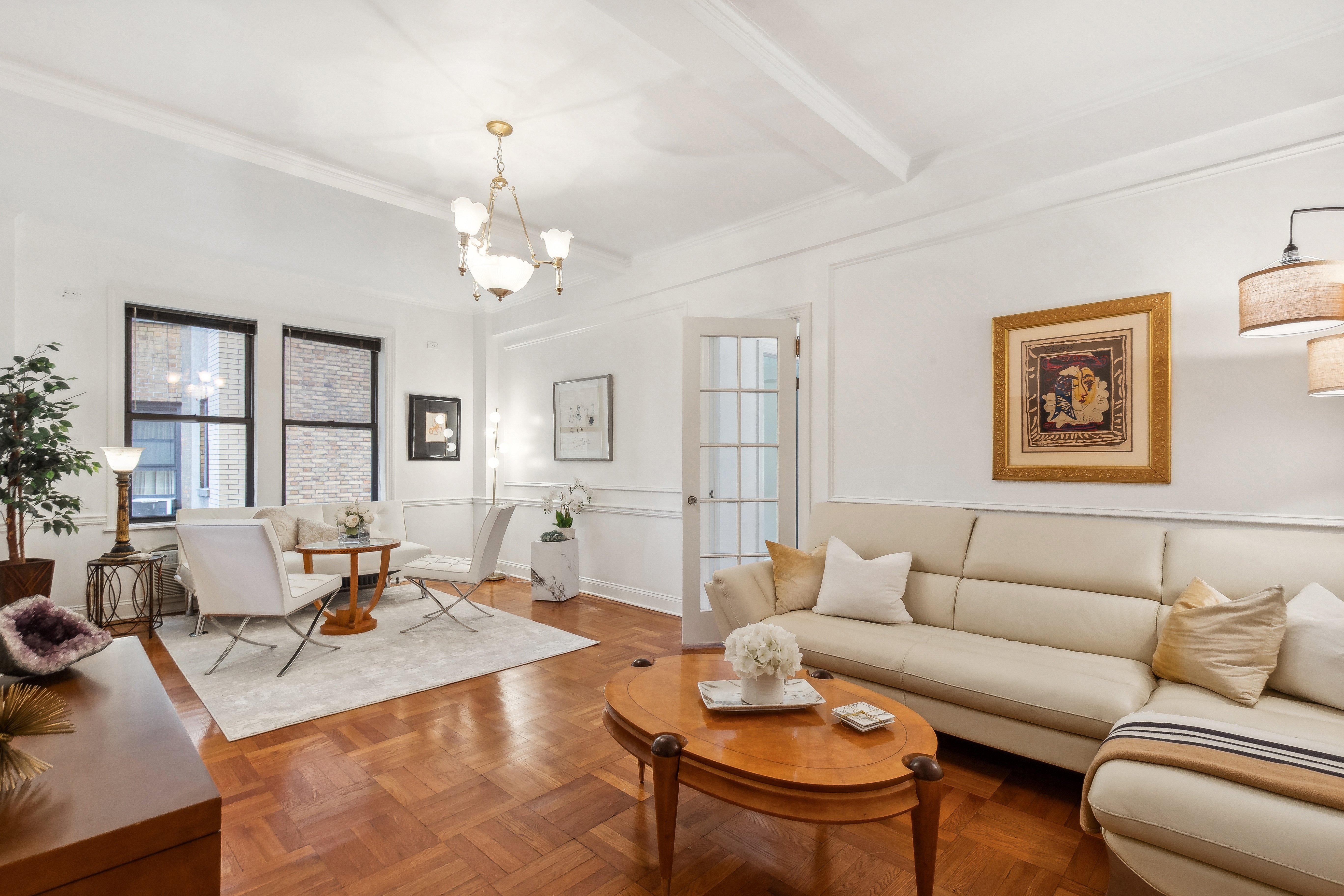 300 Riverside Drive, Unit 5E Manhattan, NY 10025 - Photo 5 of 11 a living room with furniture or couch and a table