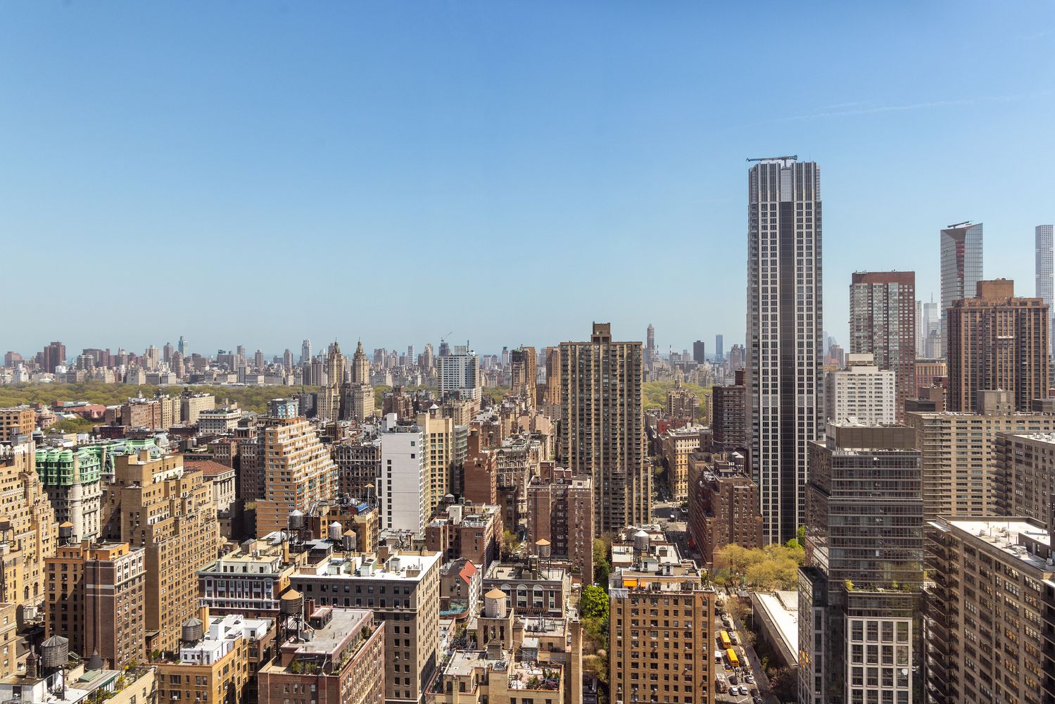 a view of a city with tall buildings