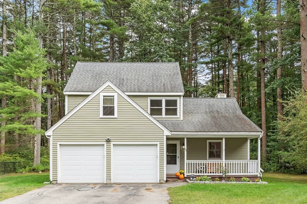 a aerial view of a yard in front of house
