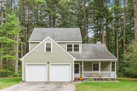a aerial view of a yard in front of house
