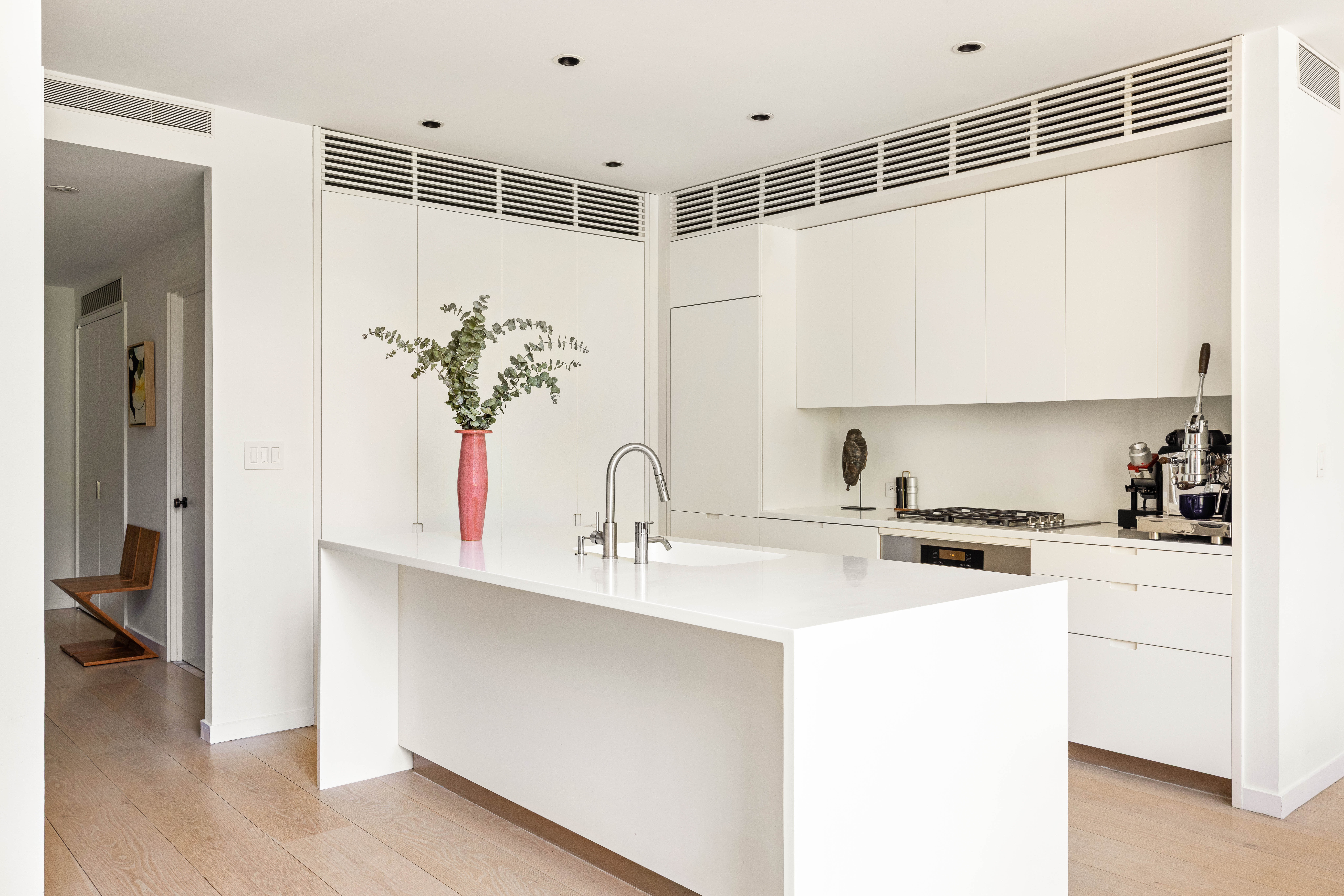 456 West 19th Street, Unit 2/3F Manhattan, NY 10011 - Photo 5 of 14 a kitchen with a sink cabinets and appliances