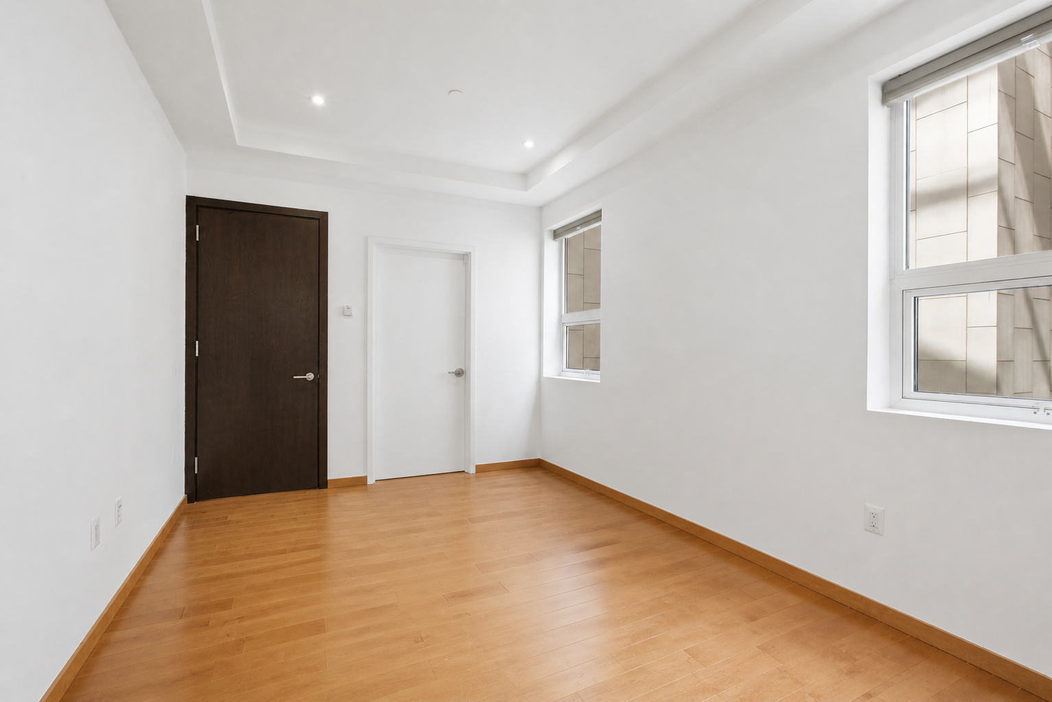 135 West 4th Street, Unit 3W Manhattan, NY 10012 - Photo 20 of 24 an empty room with windows