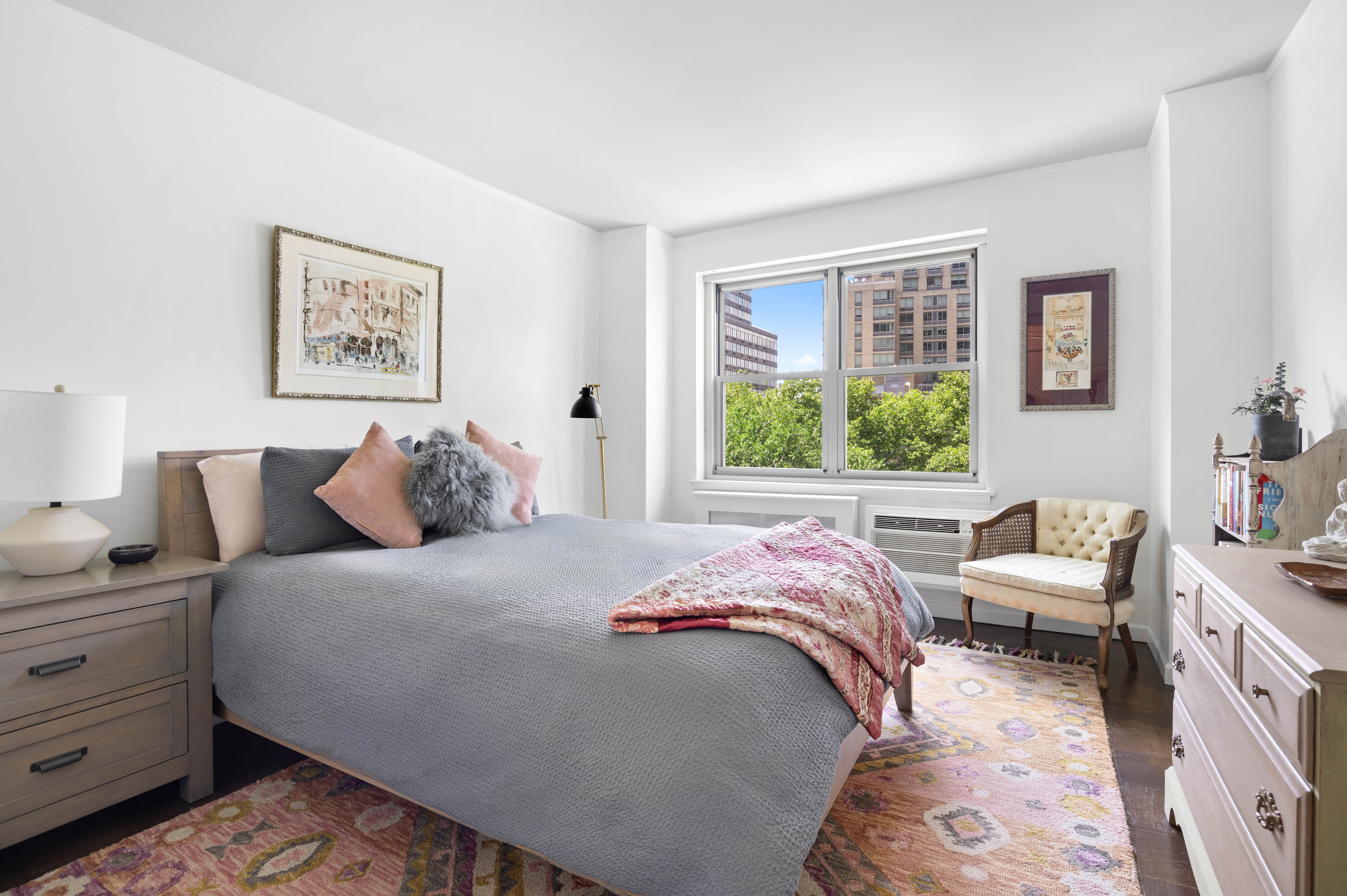 165 West End Avenue, Unit 5A Manhattan, NY 10023 - Photo 2 of 17 a bedroom with a bed and a window