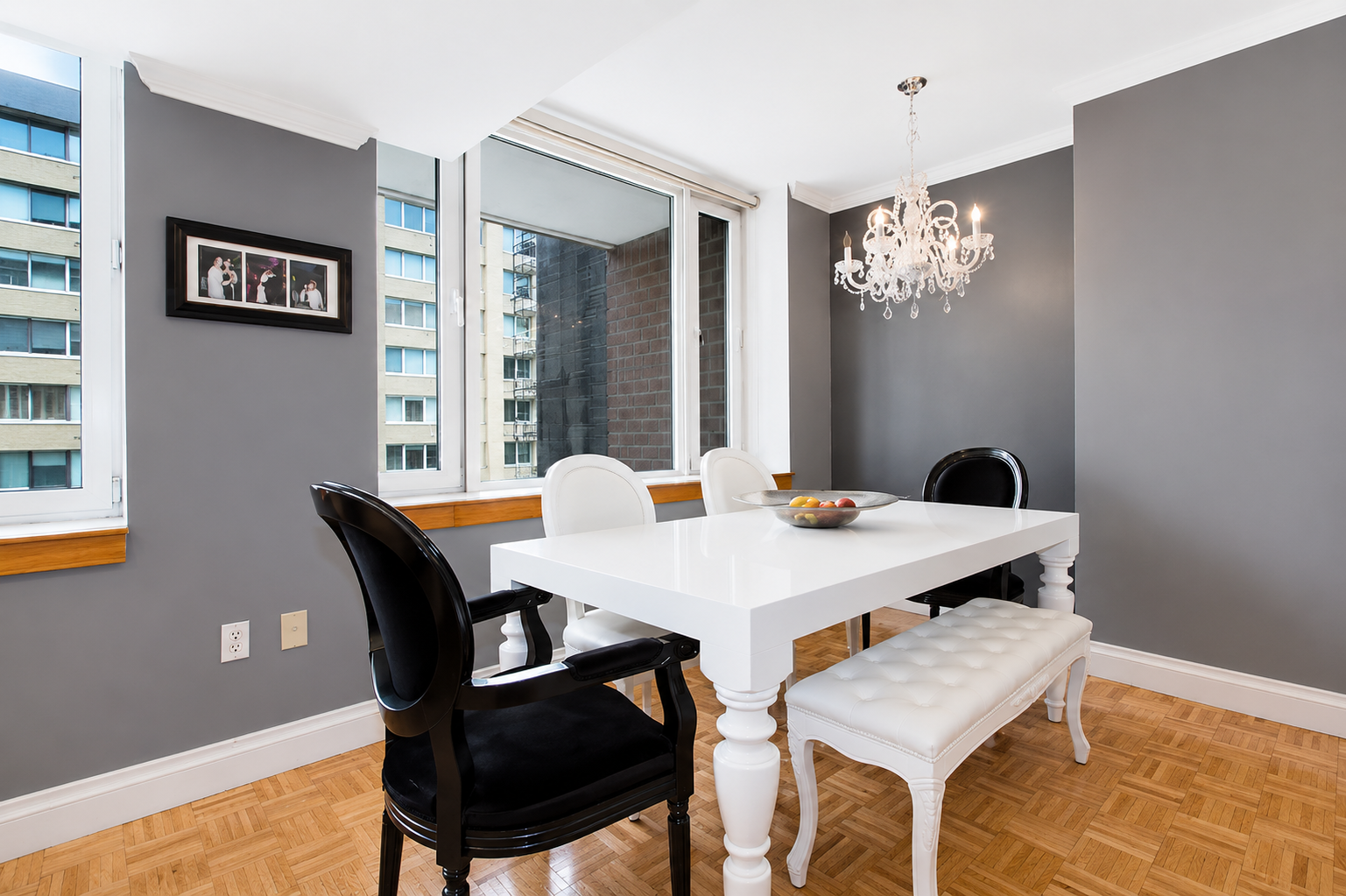 404 East 76th Street, Unit 6B Manhattan, NY 10021 - Photo 2 of 7 a view of a dining room with furniture and wooden floor