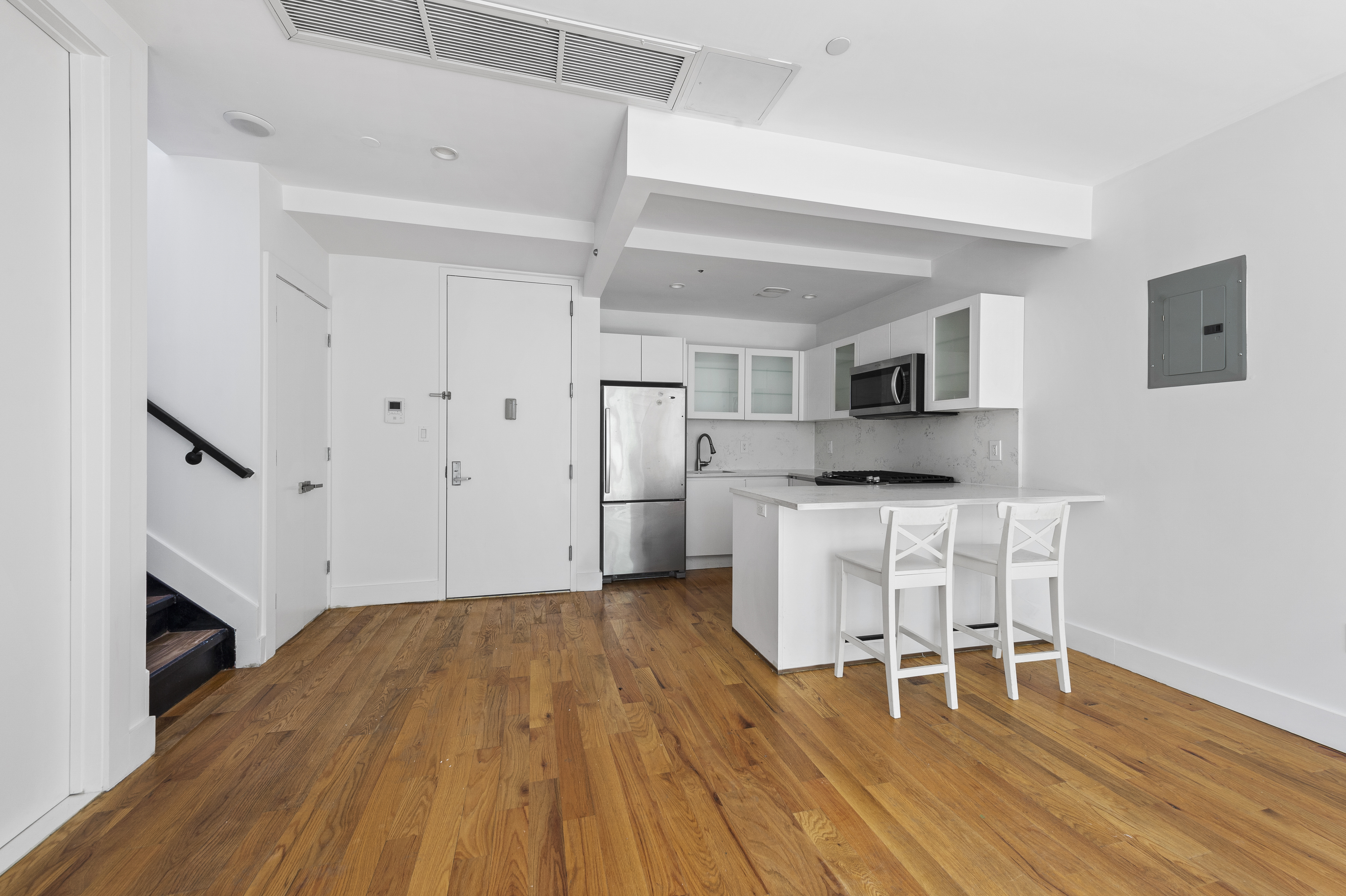 18 A Bleecker Street, Unit 4BD Brooklyn, NY 11221 - Photo 2 of 9 a view of kitchen with furniture and wooden floor