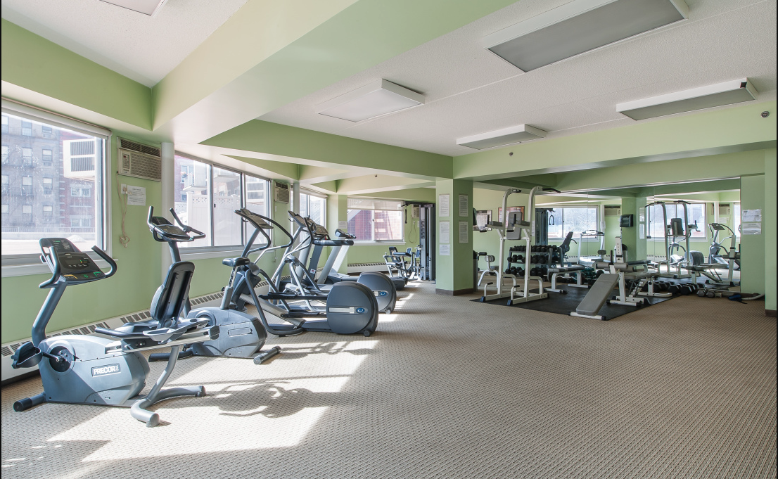 300 West 145th Street, Unit 6G Manhattan, NY 10039 - Photo 10 of 19 a view of a room with gym equipment