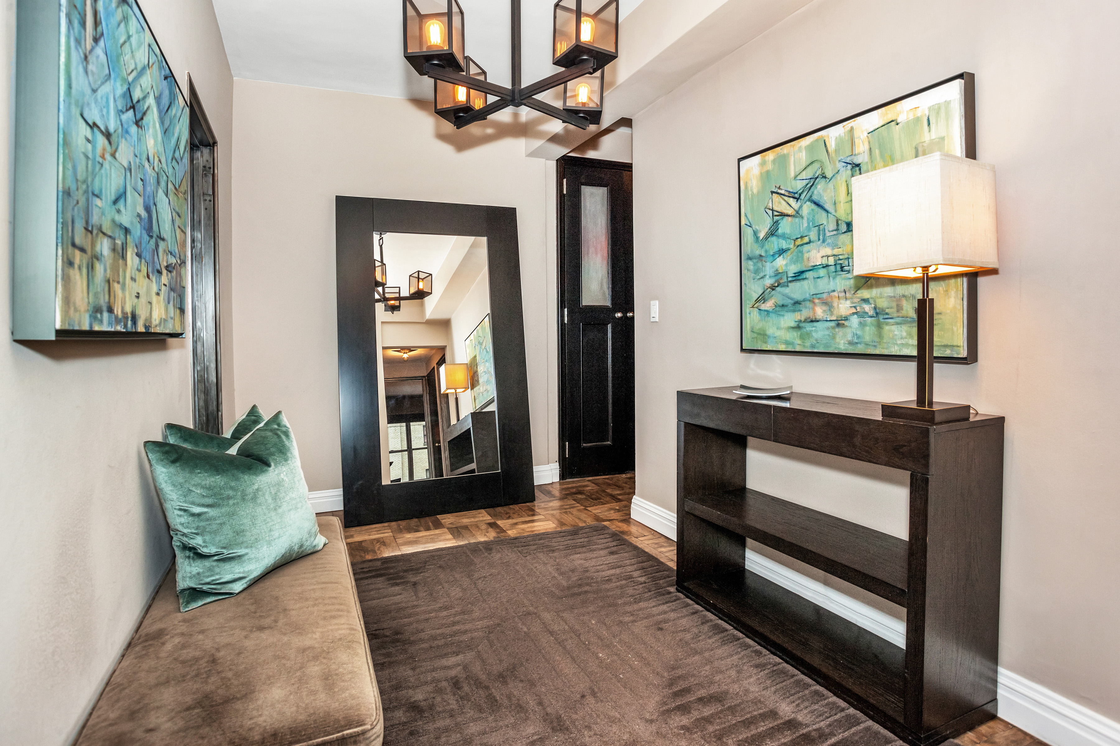 80 Park Avenue, Unit 17B Manhattan, NY 10016 - Photo 5 of 10 a living room with furniture and a window