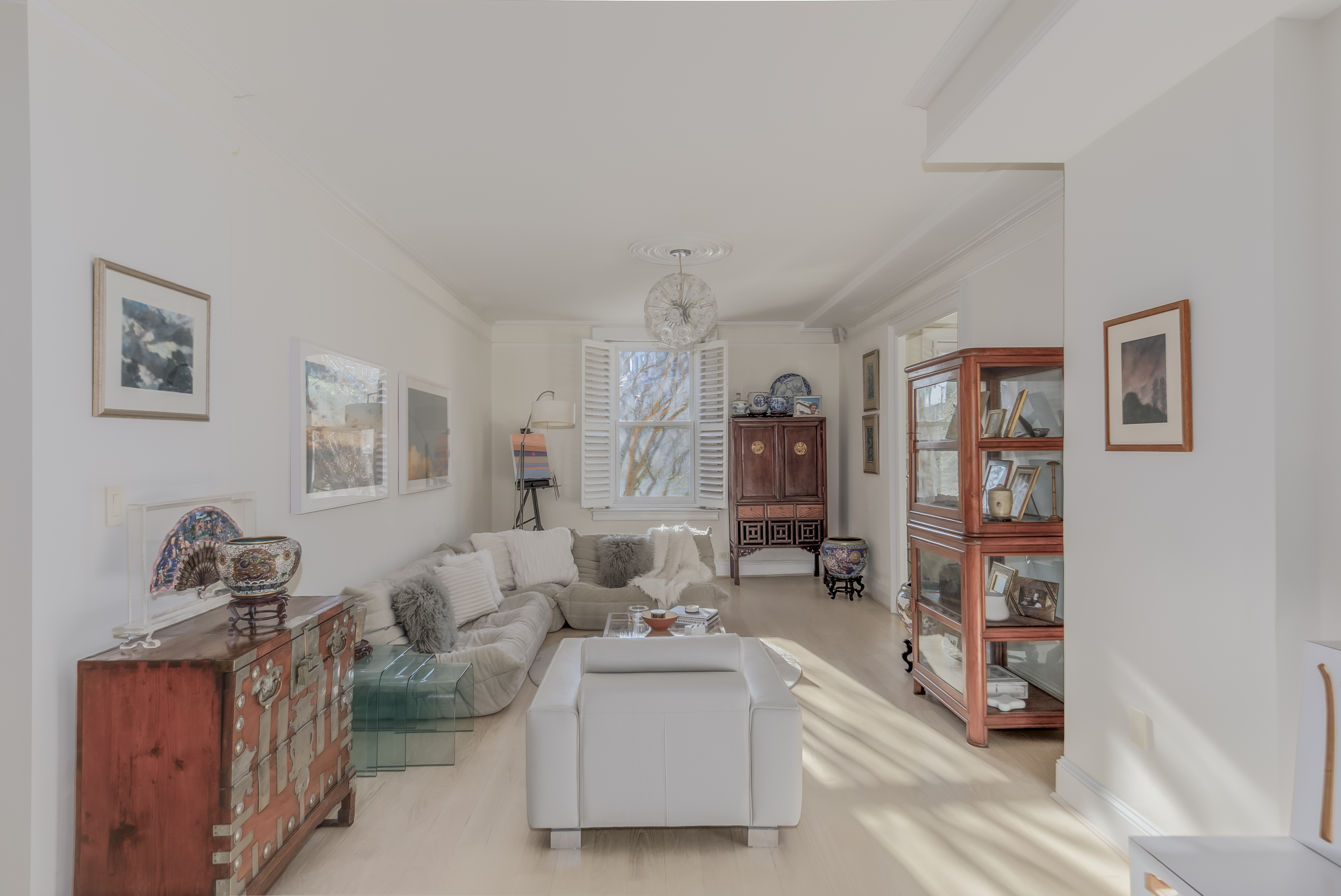 2022 Columbia Road Northwest, Unit 202 Washington, DC 20009 - Photo 2 of 15 a living room with furniture and a book shelf