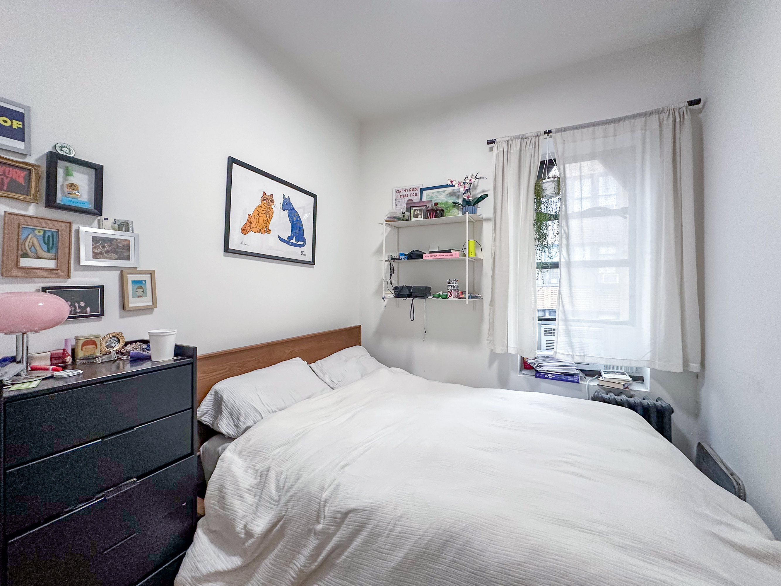 51 East 2nd Street, Unit 10 Manhattan, NY 10003 - Photo 9 of 16 a bedroom with a bed and a window