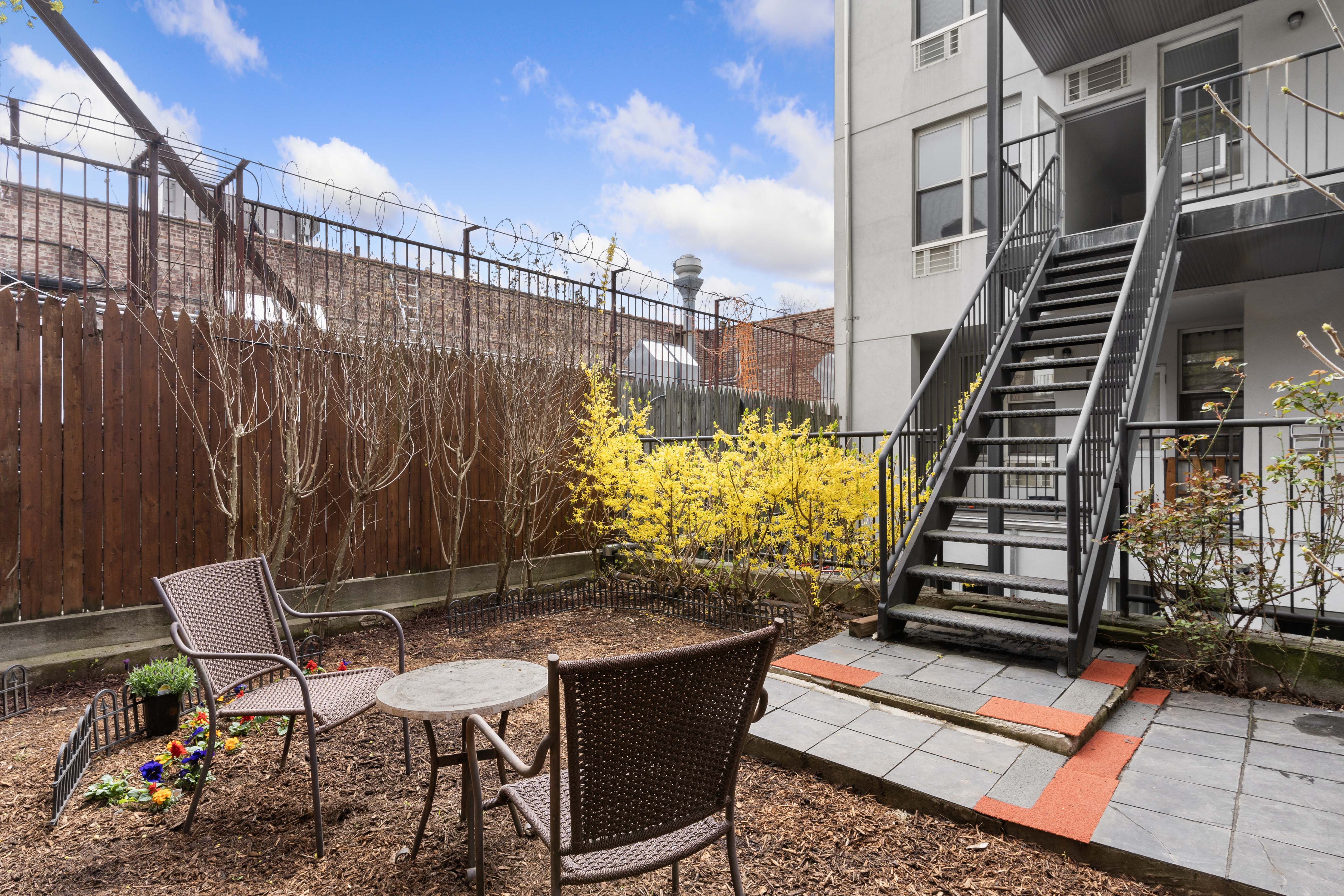 269 8th Street, Unit 2R Brooklyn, NY 11215 - Photo 12 of 14 a view of a patio with a table and chairs
