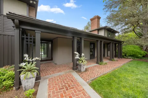 front view of a house with a patio