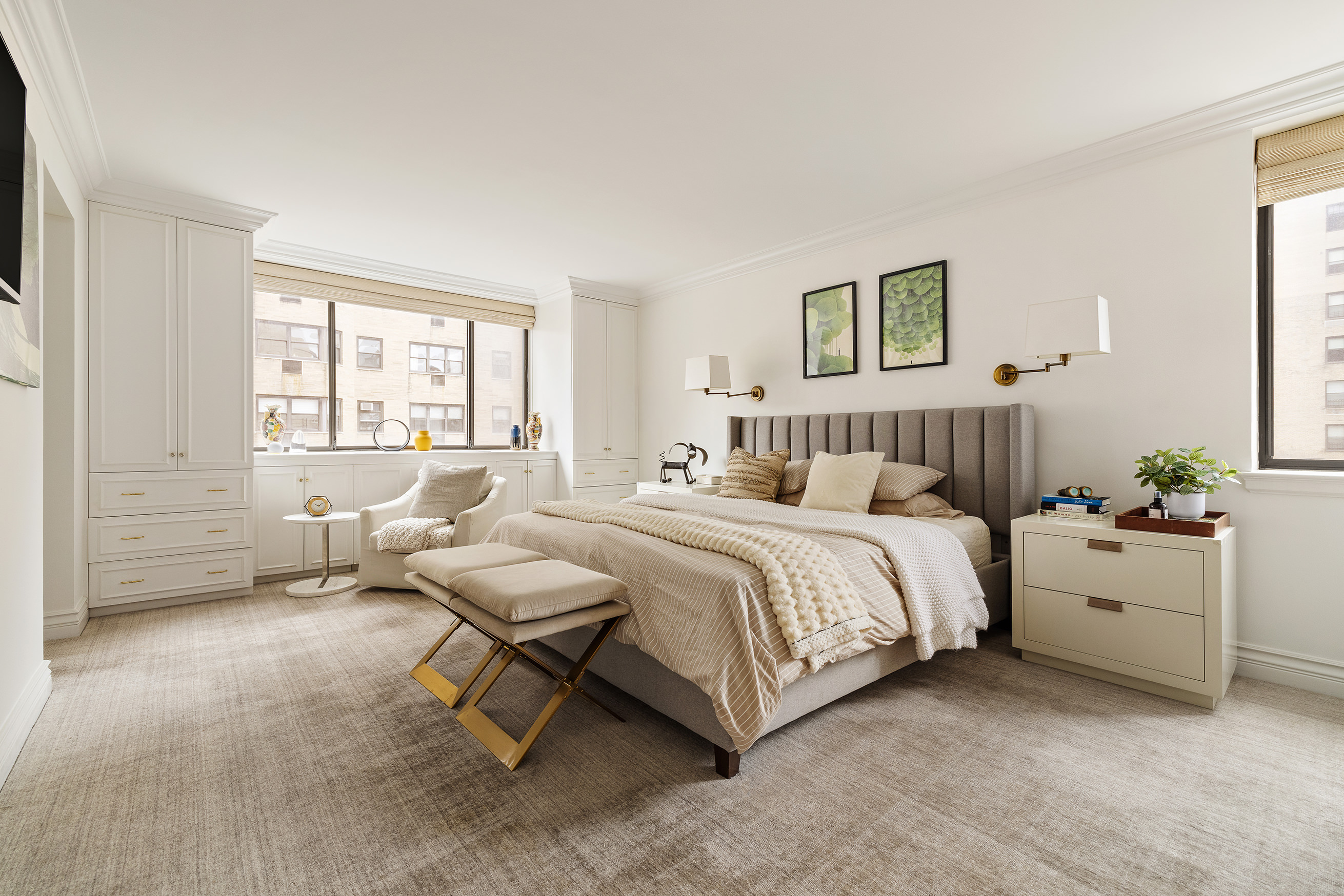 131 East 81st Street, Unit 9 Manhattan, NY 10028 - Photo 5 of 10 a spacious bedroom with a bed and a couch