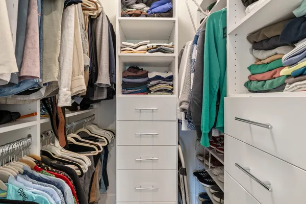 a bathroom with a toilet sink and shower
