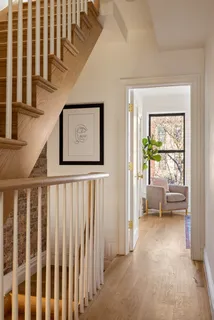 a view of a hallway with a bedroom