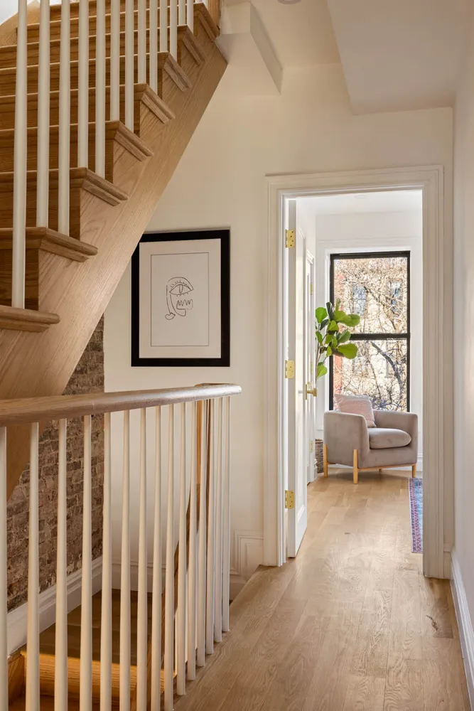 a view of a hallway with a bedroom