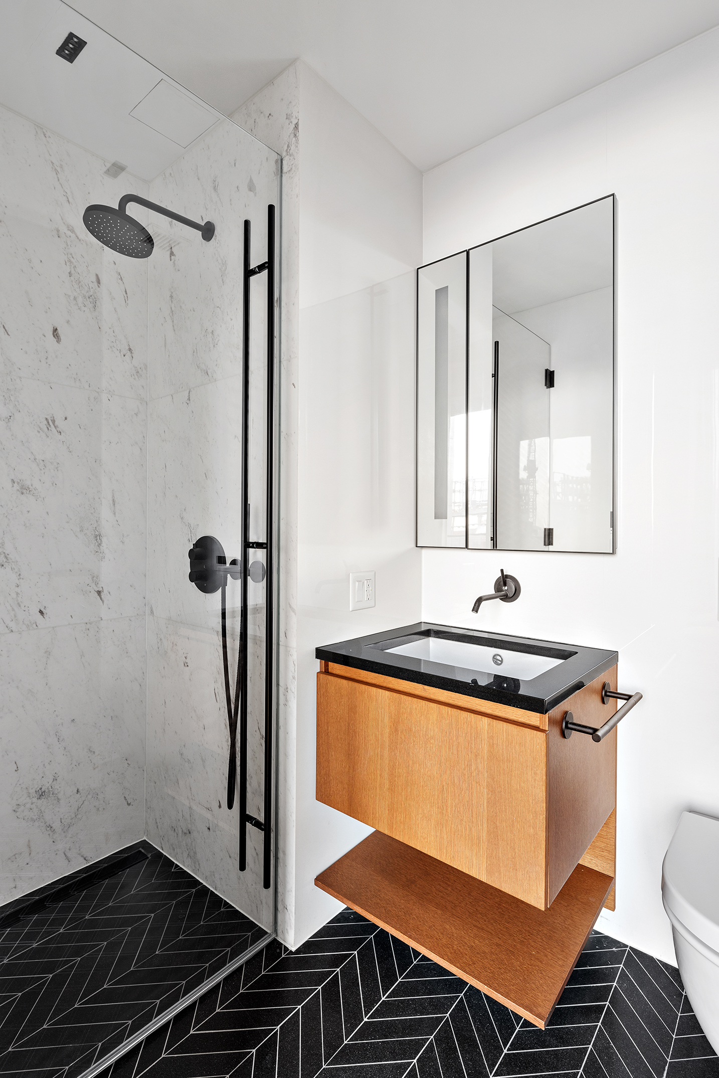 570 Broome Street, Unit PHA Manhattan, NY 10013 - Photo 16 of 22 a bathroom with a sink toilet and shower