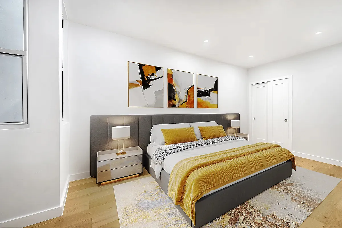 82 Clinton Avenue, Unit 4 Brooklyn, NY 11205 - Photo 3 of 11 a bedroom with a bed and painting on the wall