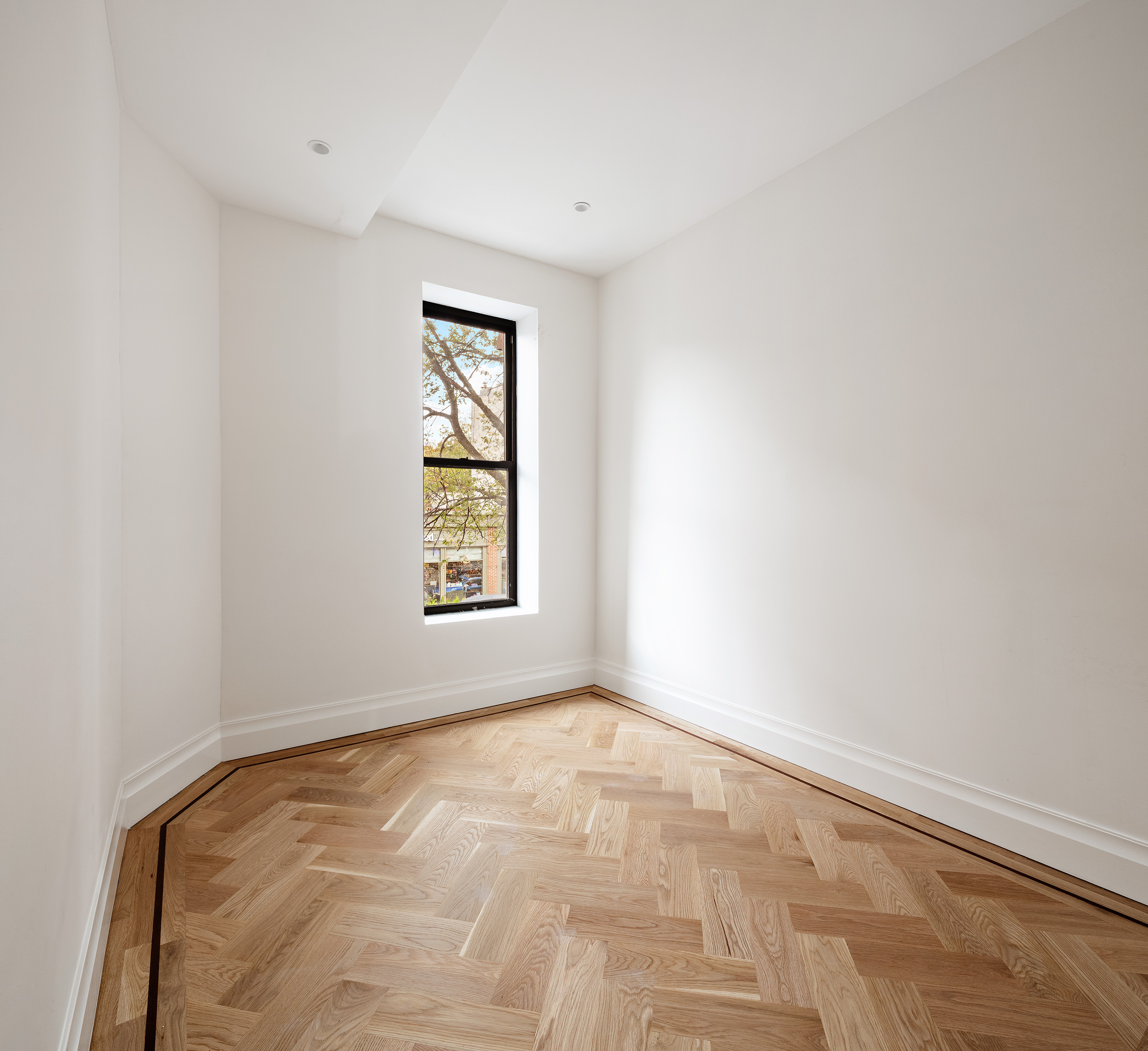 80 7th Avenue, Unit 2 Brooklyn, NY 11217 - Photo 5 of 8 an empty room with windows