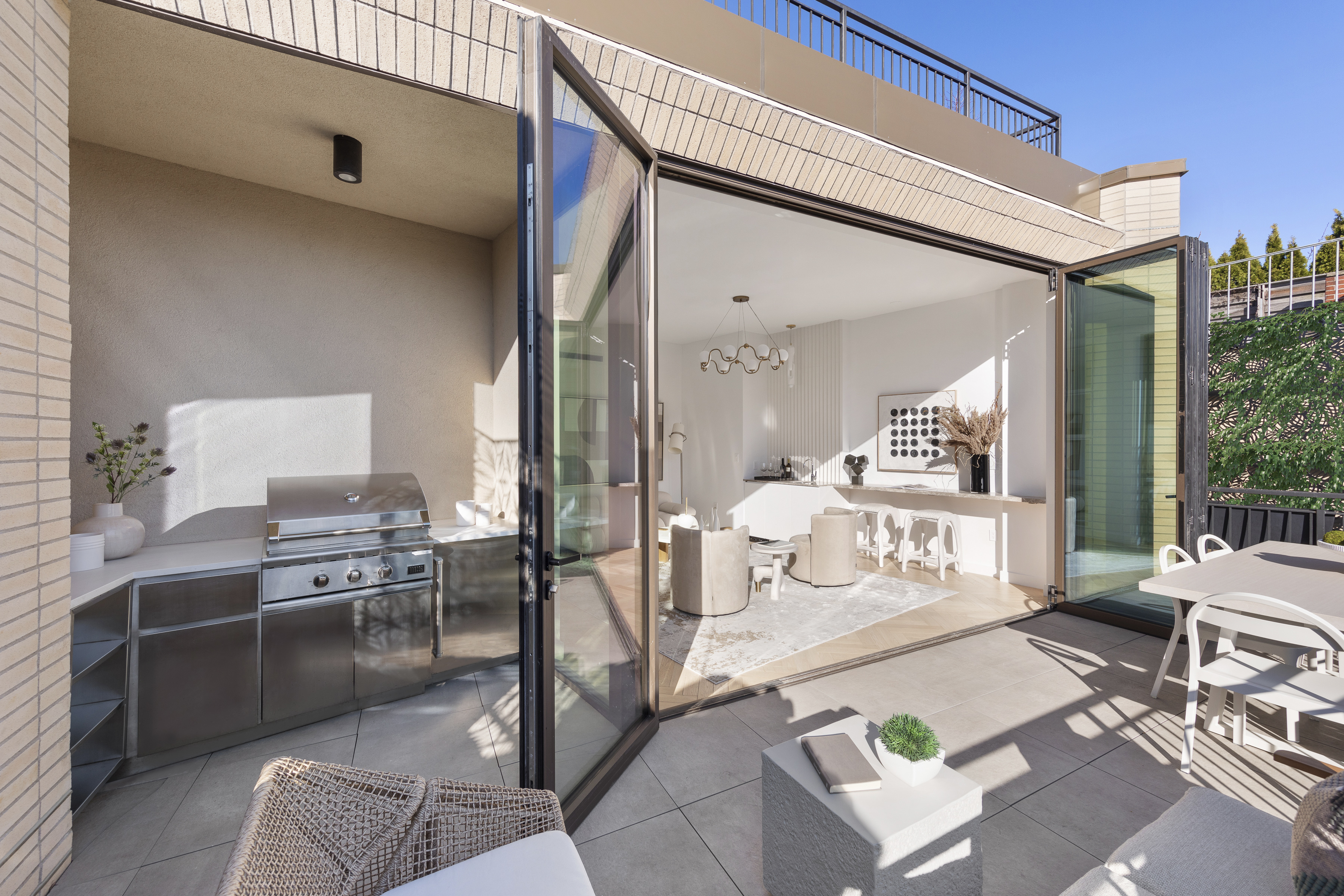 378 Broome Street, Unit PH Manhattan, NY 10013 - Photo 4 of 25 a living room with furniture and a table