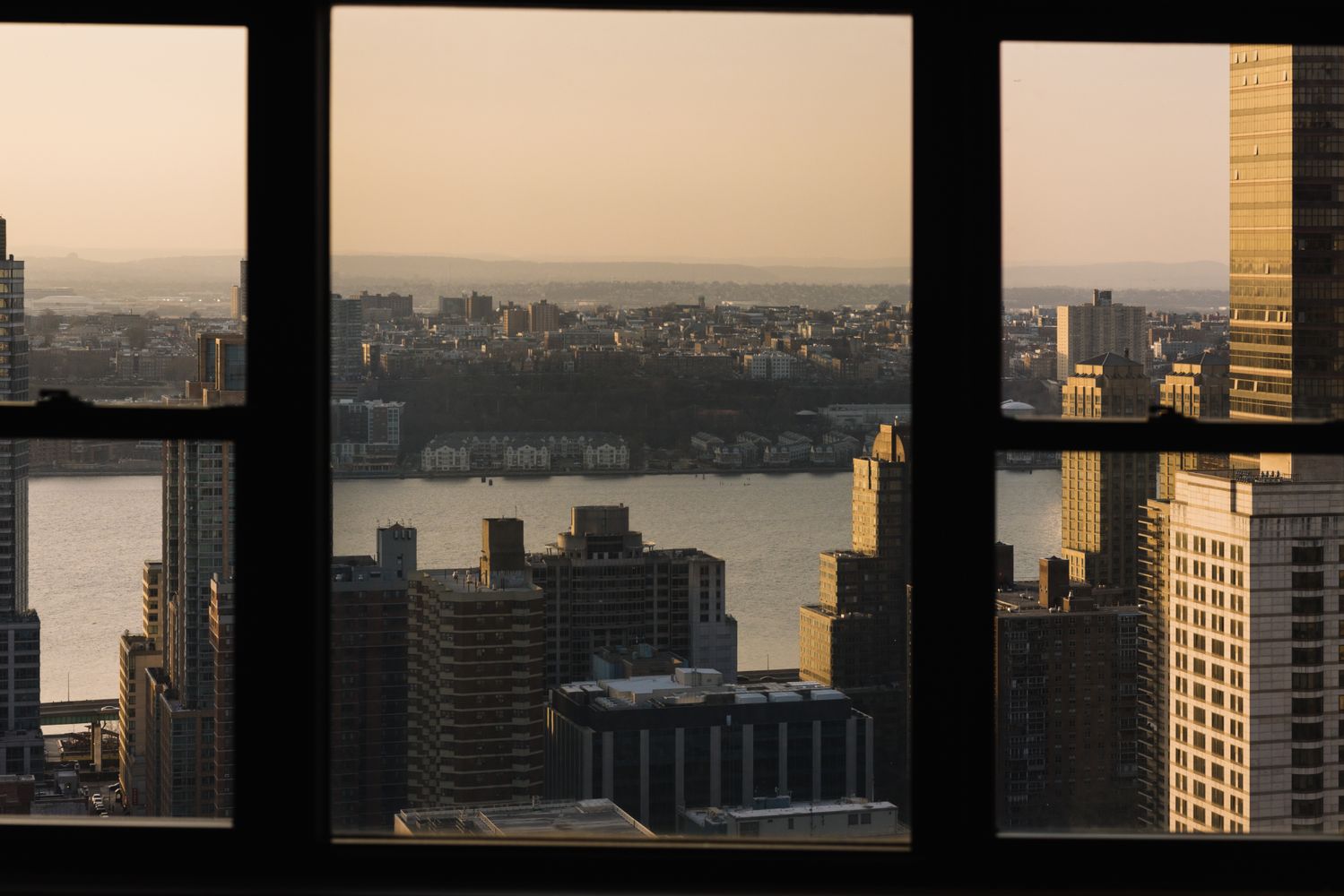a view of a lake from a balcony