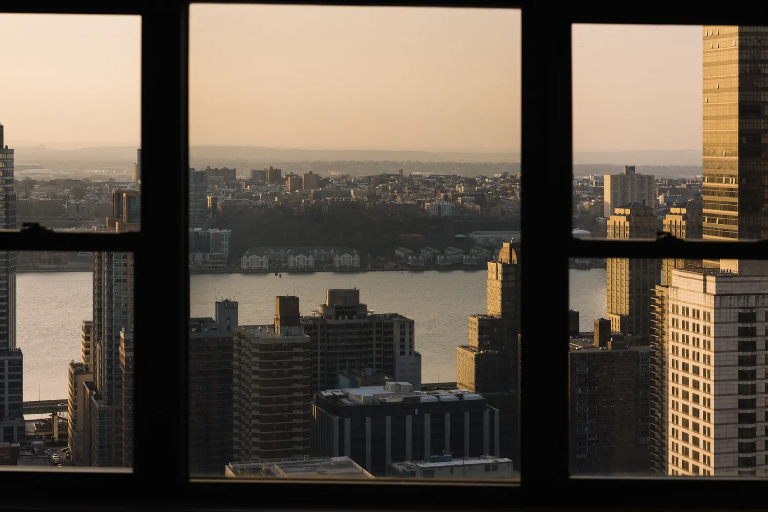 a view of a lake from a balcony