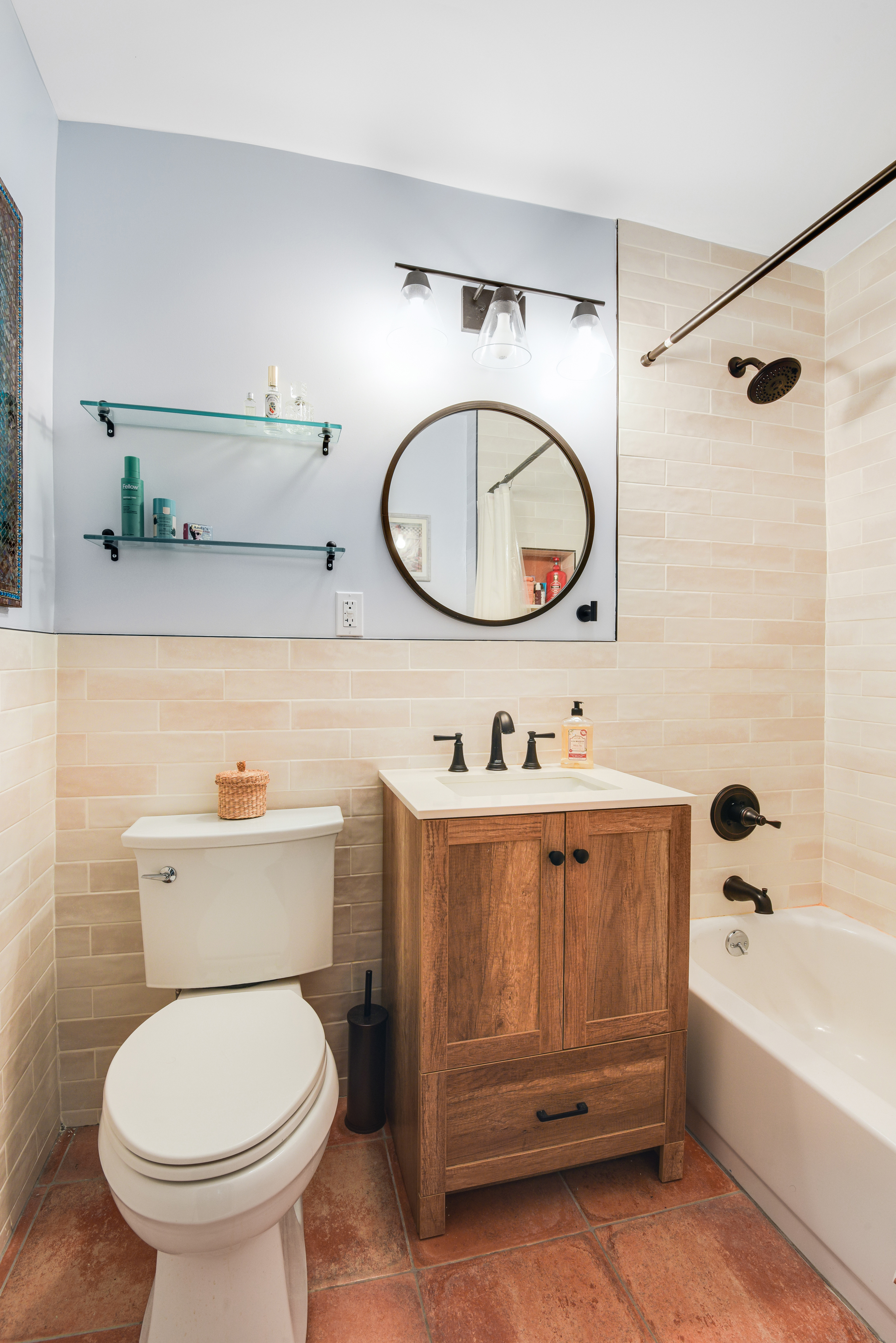 400 East 17th Street, Unit 711 Brooklyn, NY 11226 - Photo 8 of 12 a bathroom with a sink a toilet and a bathtub
