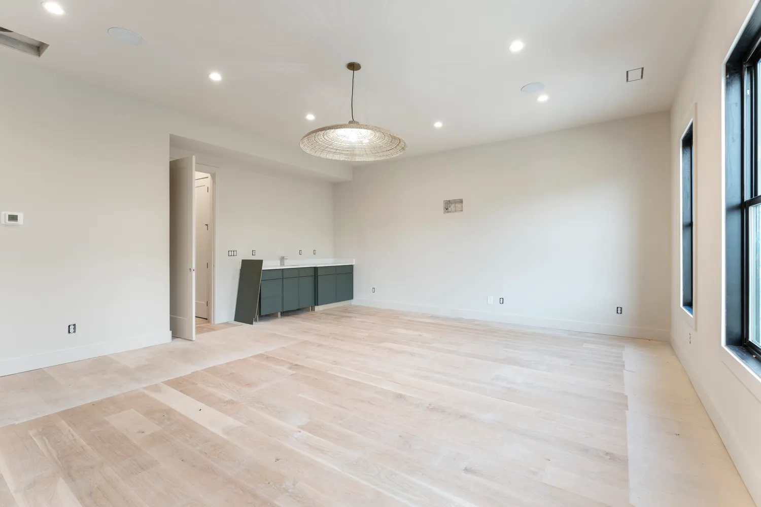 a bathroom with a sink toilet vanity and bathtub