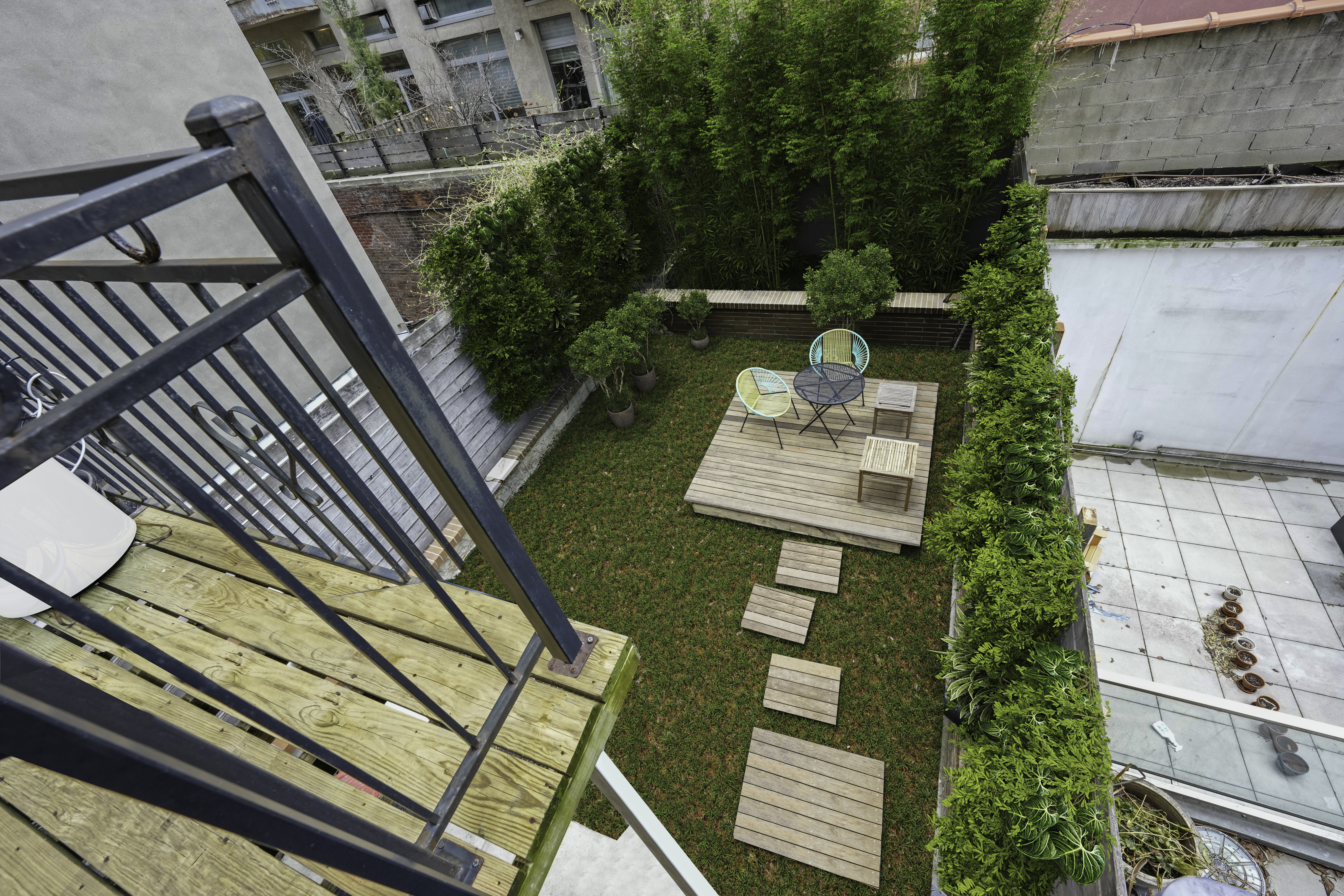 133 West 123rd Street Manhattan, NY 10027 - Photo 27 of 31 a view of yard from deck