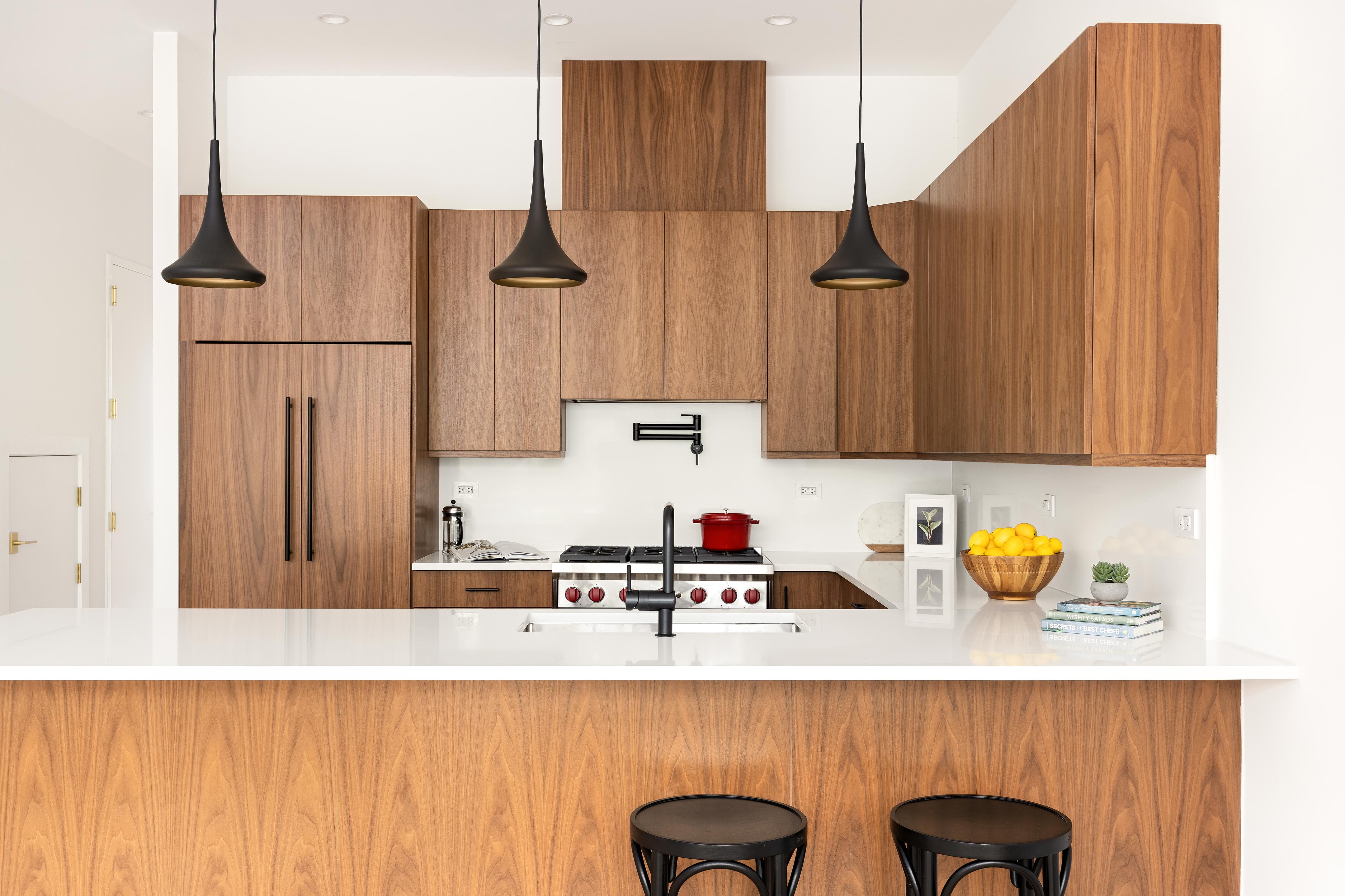 282 17th Street, Unit 2 Brooklyn, NY 11215 - Photo 4 of 11 a kitchen with a sink and a refrigerator