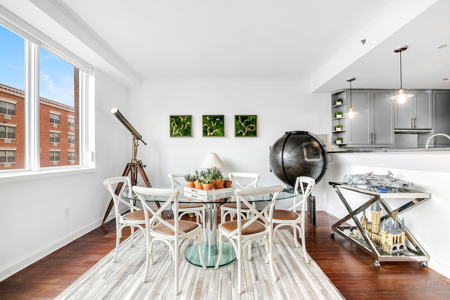 32 West 128th Street, Unit 4 Manhattan, NY 10027 - Photo 1 of 11 a dining room with furniture and wooden floor