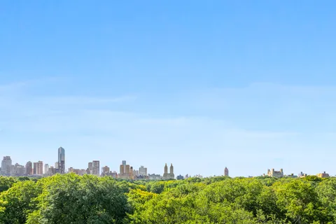 a view of a city with tall buildings