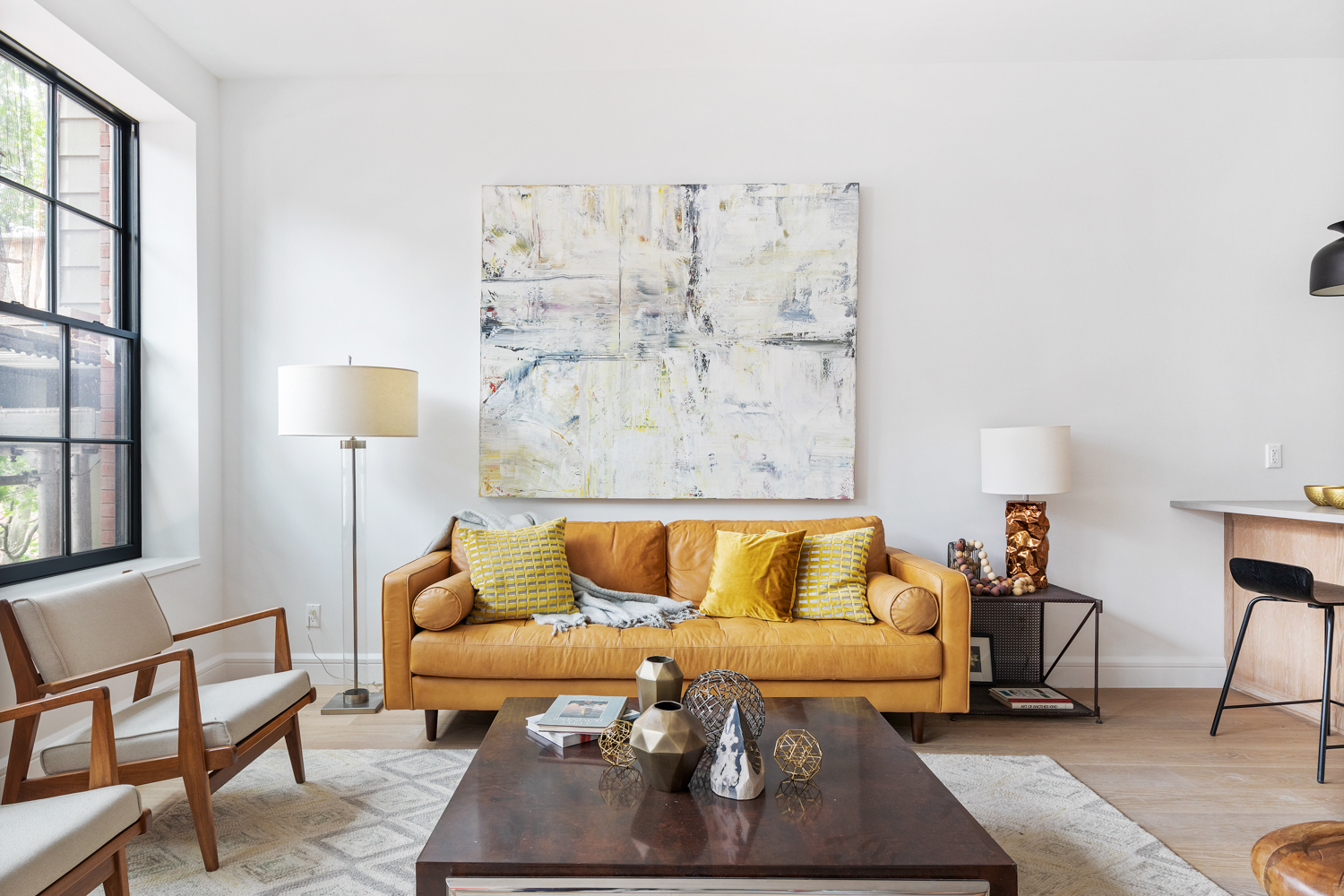 243 North 5th Street, Unit 2B Brooklyn, NY 11211 - Photo 4 of 14 a living room with furniture and a lamp