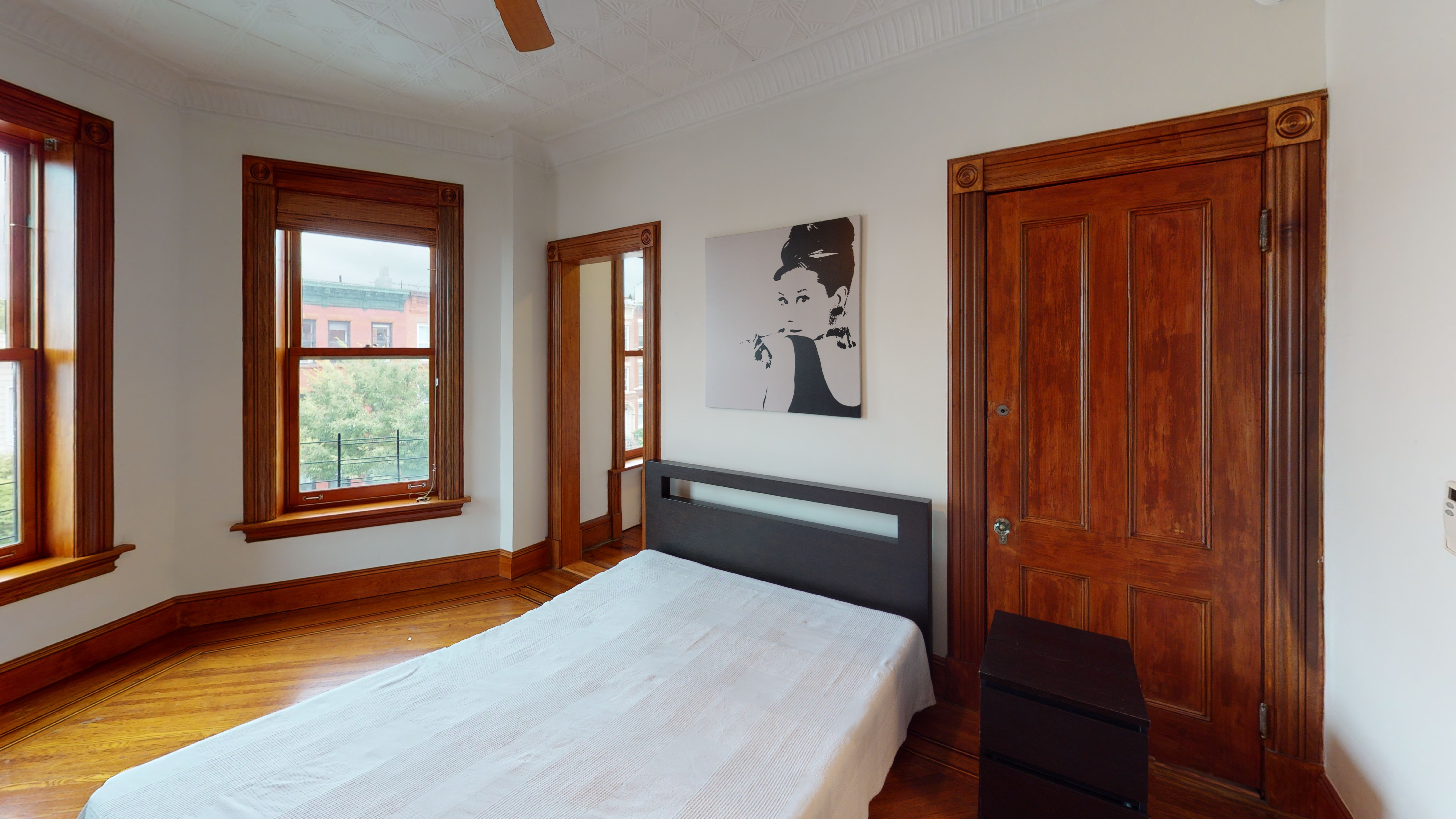 332 15th Street, Unit 3 Brooklyn, NY 11215 - Photo 2 of 8 a bedroom with a bed and a window