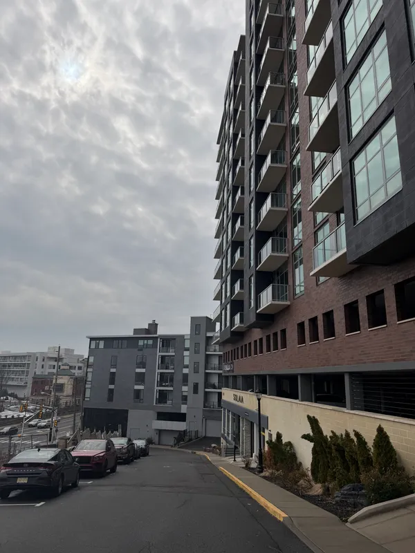 a view of city with tall buildings