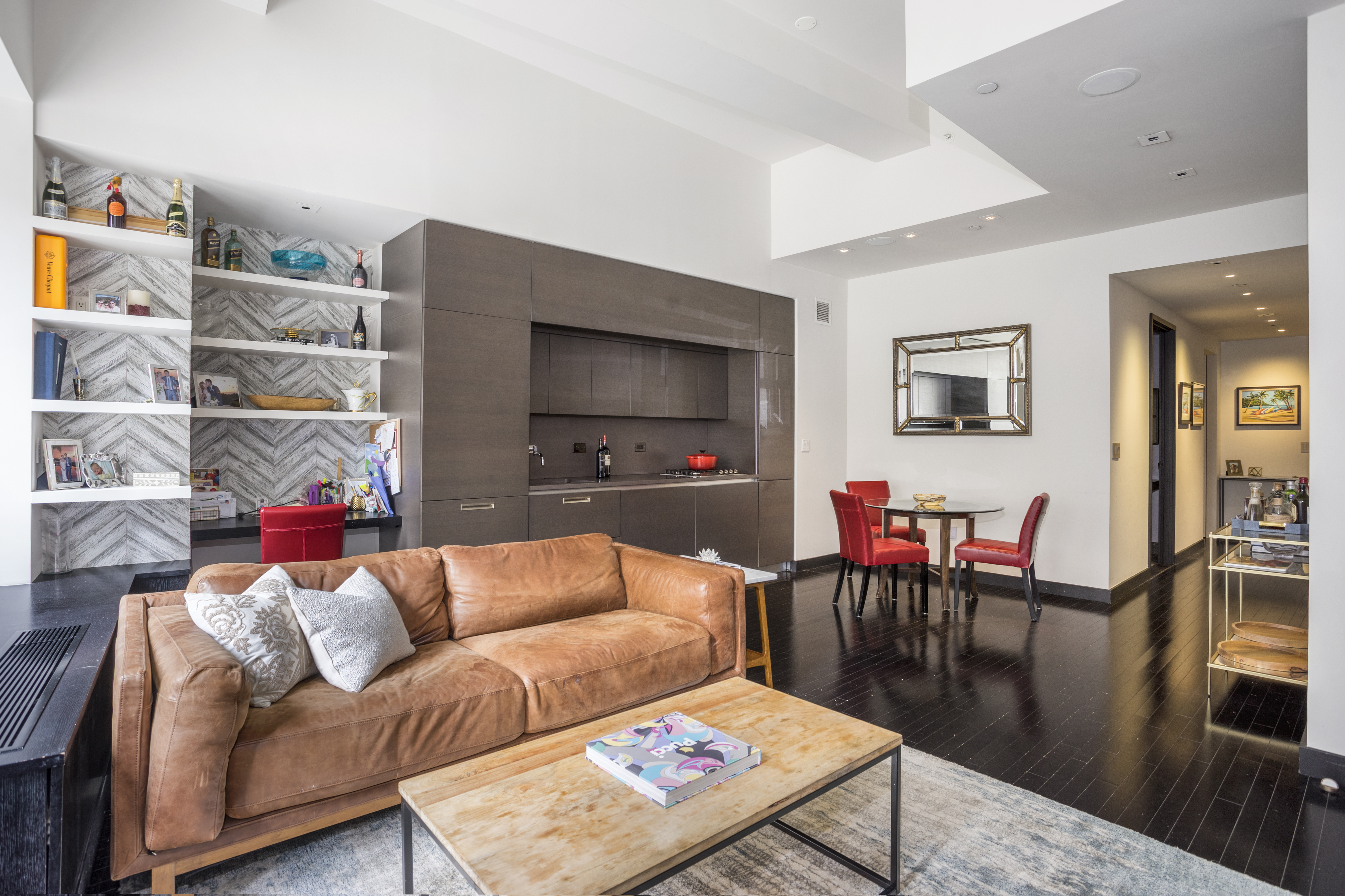 20 Pine Street, Unit 409 Manhattan, NY 10005 - Photo 4 of 11 a living room with furniture and a flat screen tv