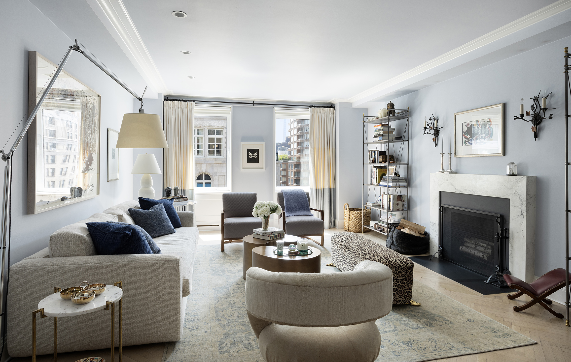 49 East 86th Street, Unit 11A Manhattan, NY 10028 - Photo 1 of 10 a living room with furniture fireplace and window