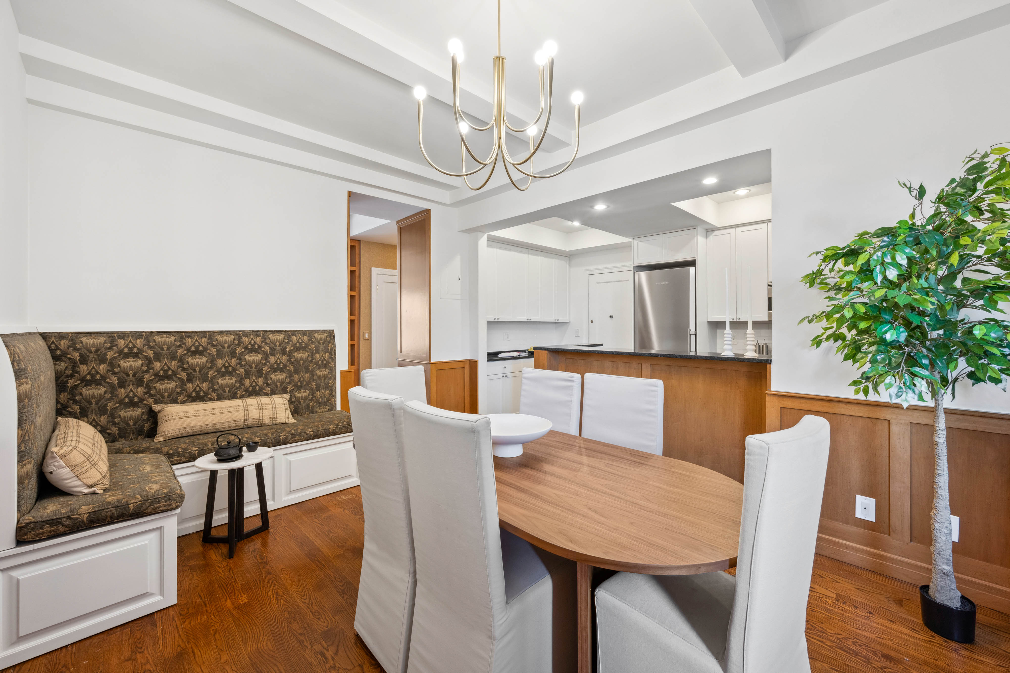 25 5th Avenue, Unit 6C Manhattan, NY 10003 - Photo 6 of 16 a view of a dining room with furniture and wooden floor