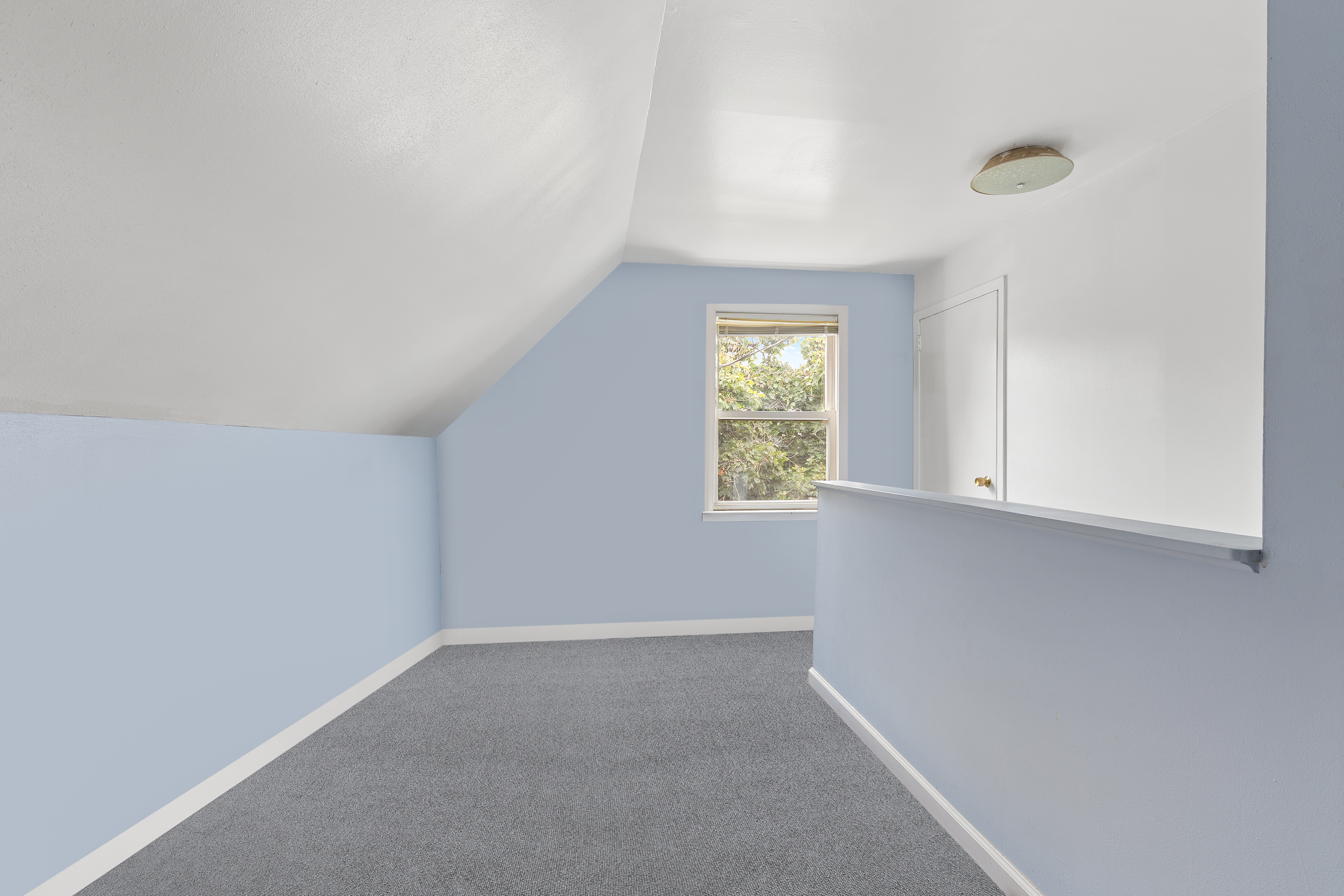 241-12 148th Avenue Queens, NY 11422 - Photo 12 of 15 an empty room with windows