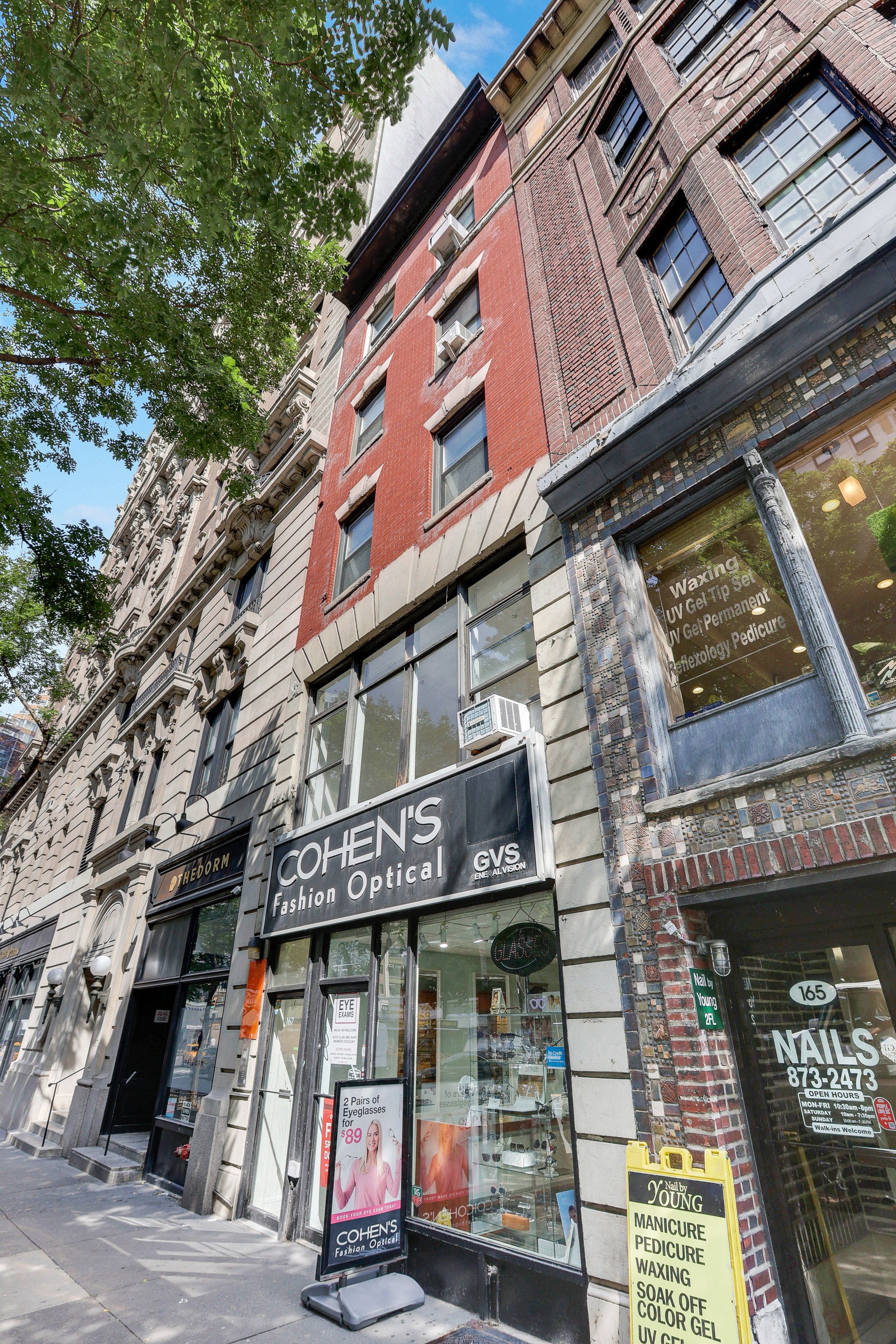 167 West 72nd Street Manhattan, NY 10023 - Photo 2 of 25 a view of a building with retail shops