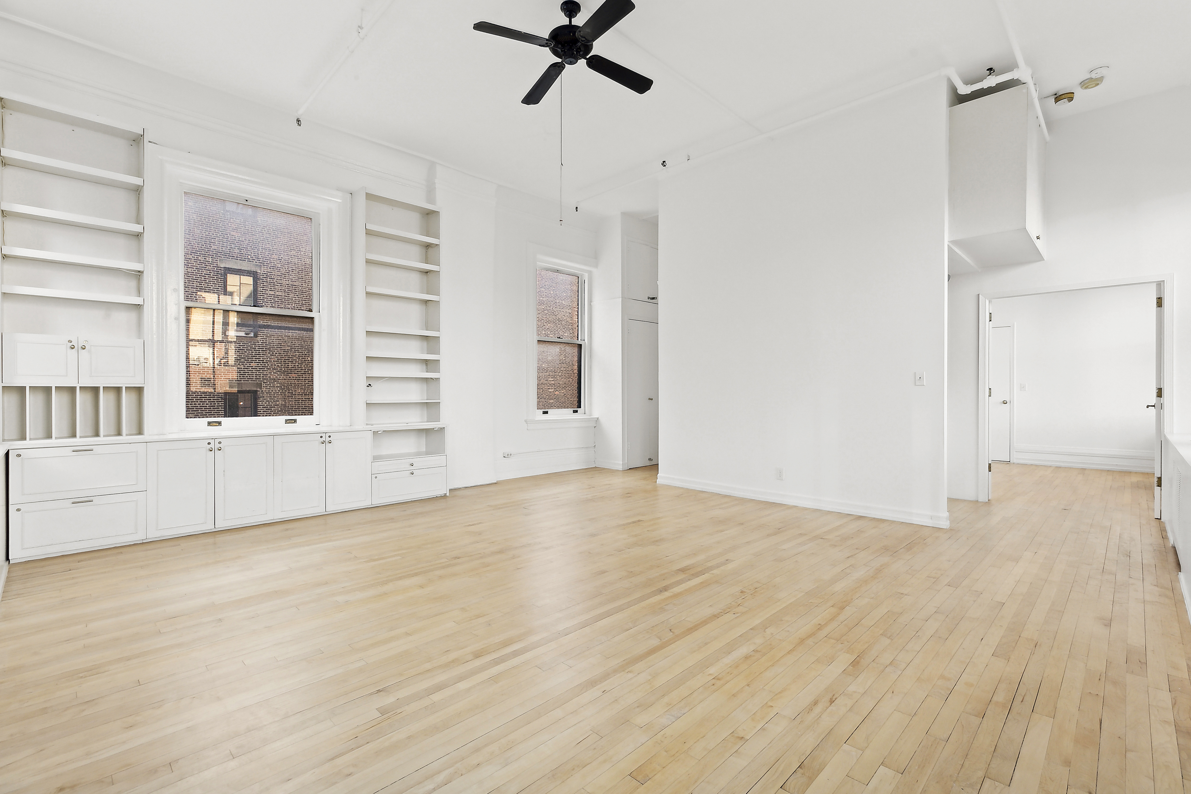 874 Broadway, Unit 907 Manhattan, NY 10003 - Photo 13 of 14 a view of an empty room with a window