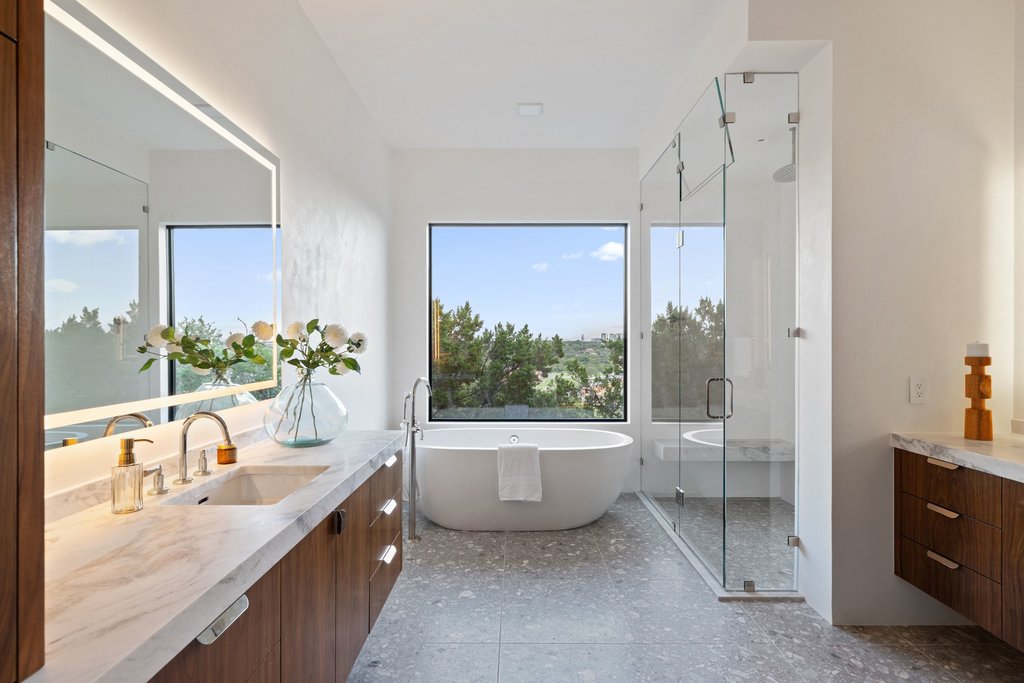 Mt Bonnell Road Austin, TX 78731 - Photo 29 of 51 a bathroom with a granite countertop tub sink and mirror