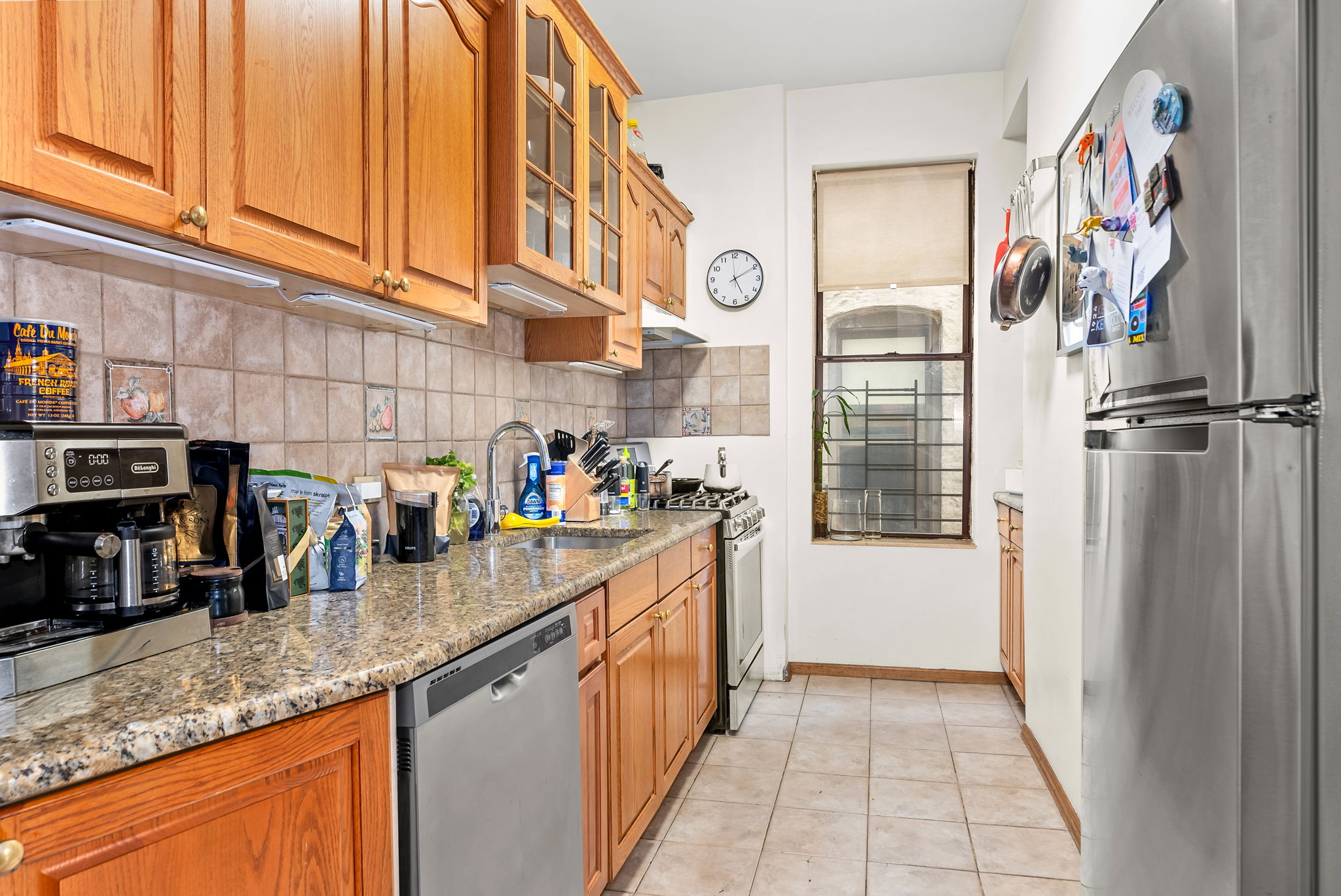 461 3rd Street, Unit 3L Brooklyn, NY 11215 - Photo 7 of 10 a kitchen with stainless steel appliances granite countertop a refrigerator and a sink