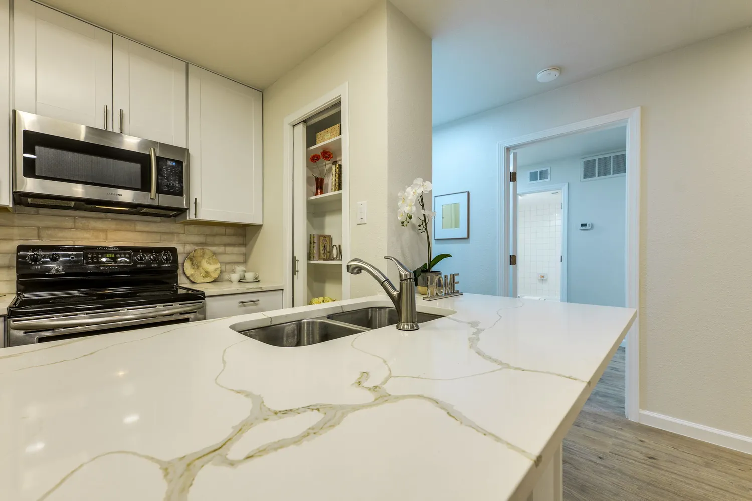 a bathroom with a bathtub and a sink