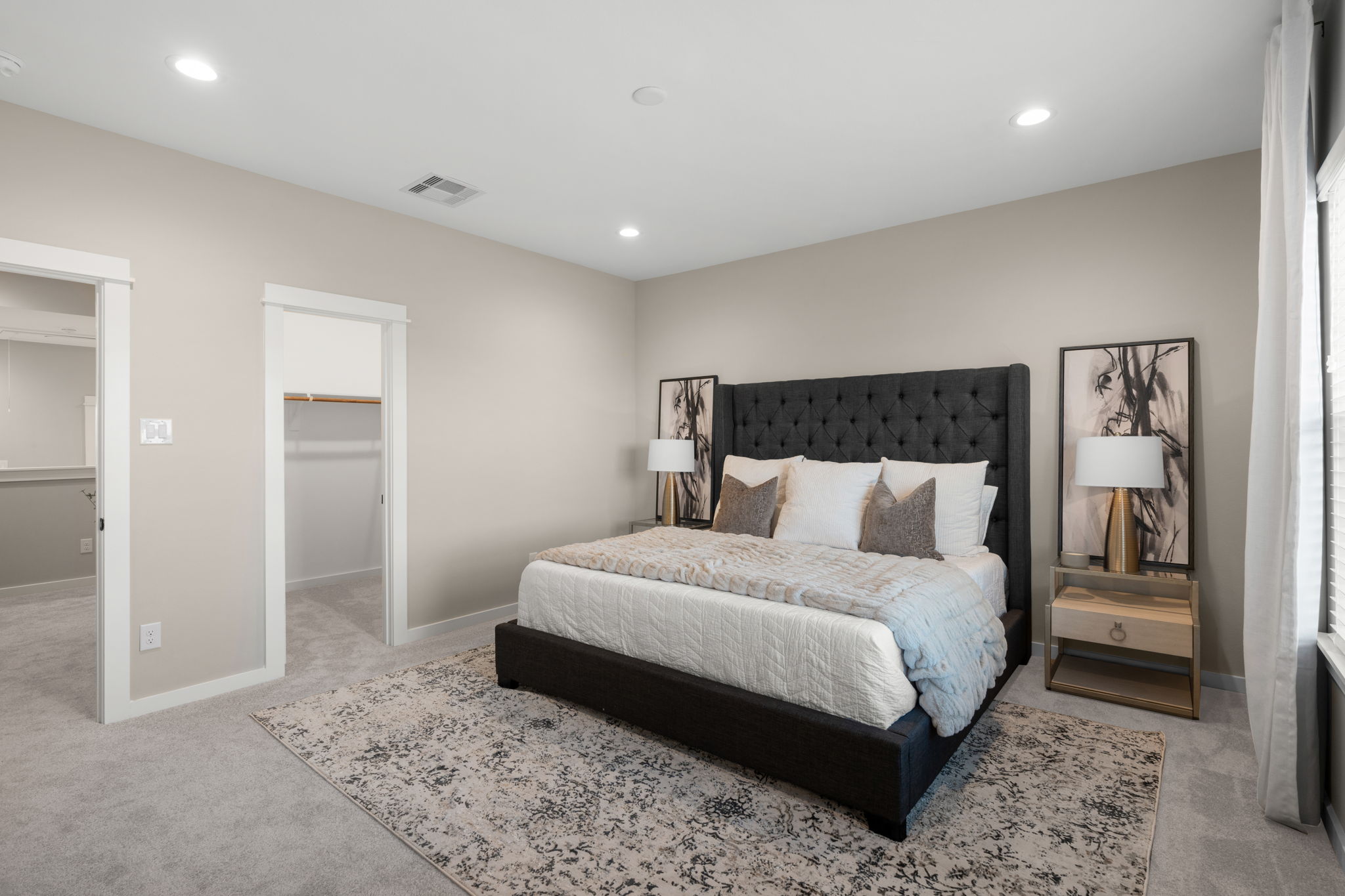 11303 Stonework Grv Lane Houston, TX 77076 - Photo 20 of 39 a bedroom with a bed and a view of bathroom