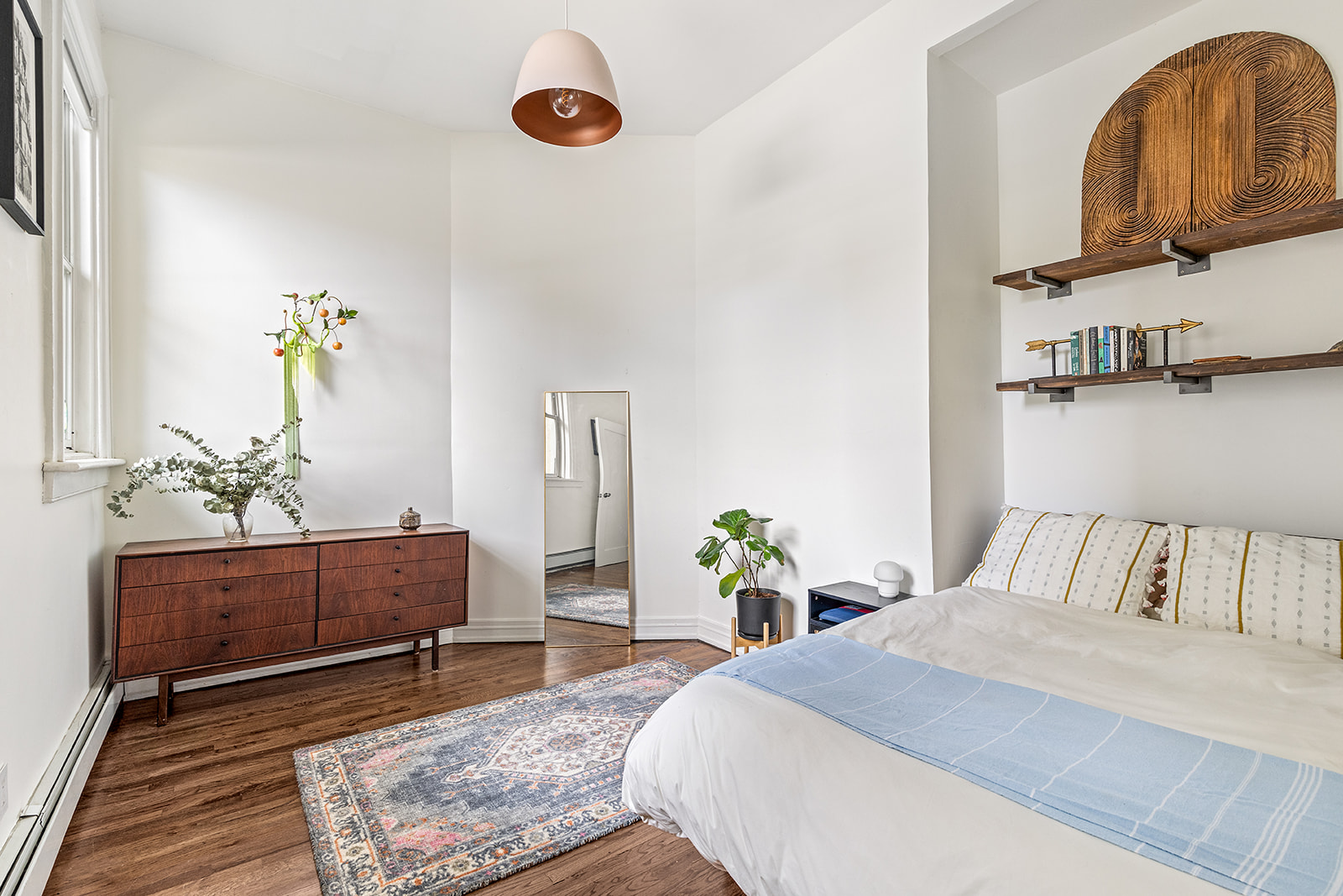 110 Clinton Avenue, Unit 1C Brooklyn, NY 11205 - Photo 5 of 12 a living room with furniture and wooden floor