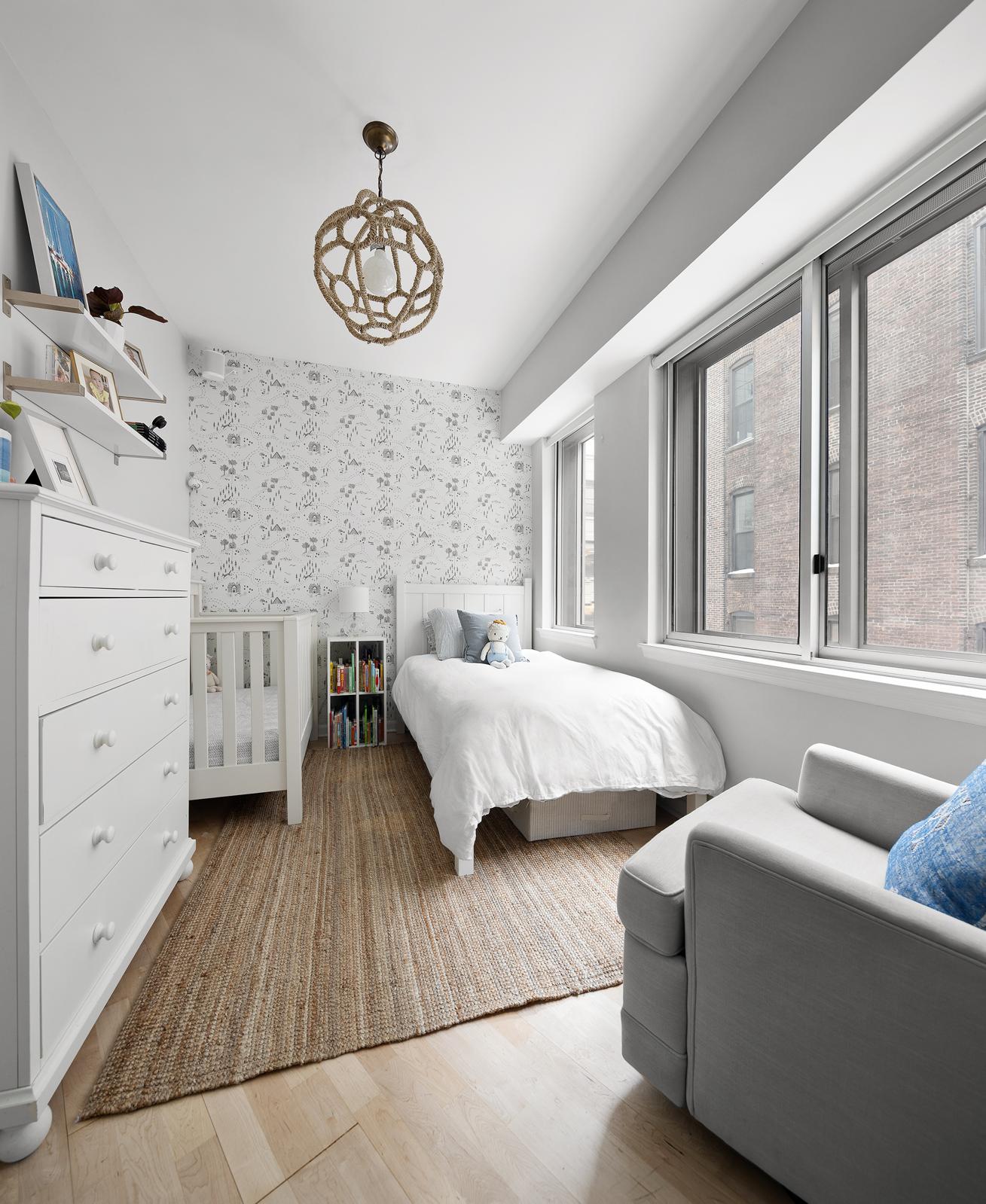 133 Water Street, Unit 5A Brooklyn, NY 11201 - Photo 8 of 13 a bedroom with a bed and a large window